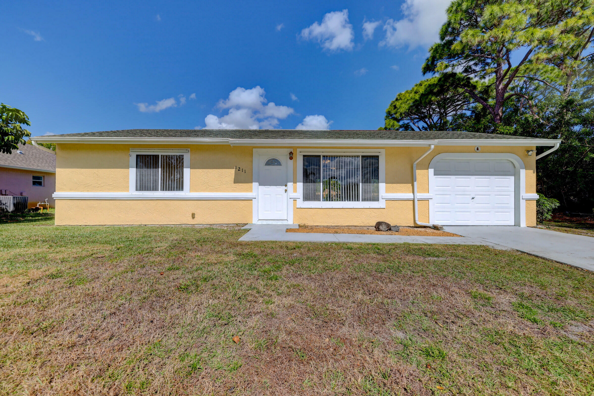 Property Photo:  1211 SW Sudder Lane  FL 34953 