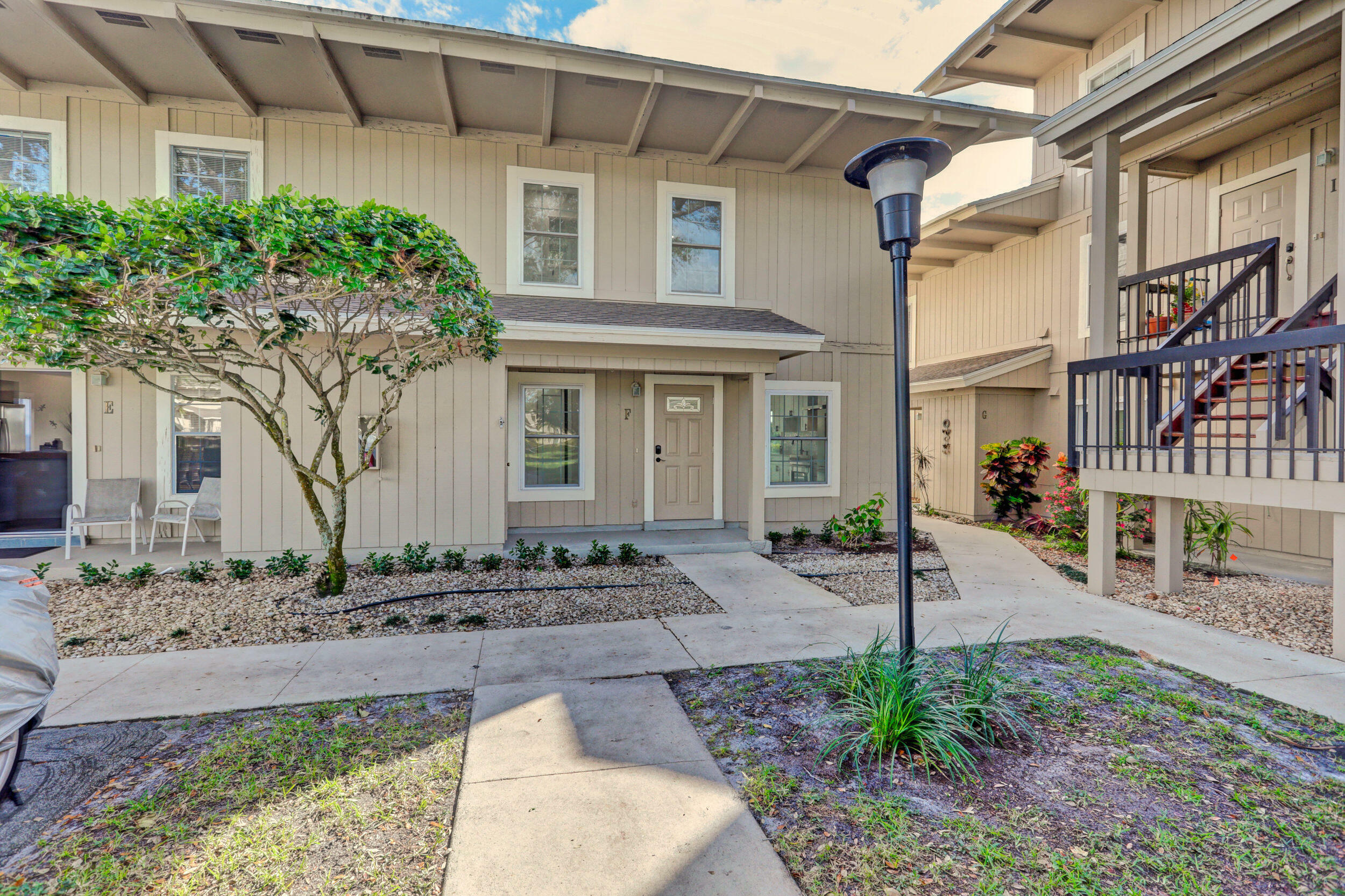 Property Photo:  18590 SE Wood Haven Lane F  FL 33469 