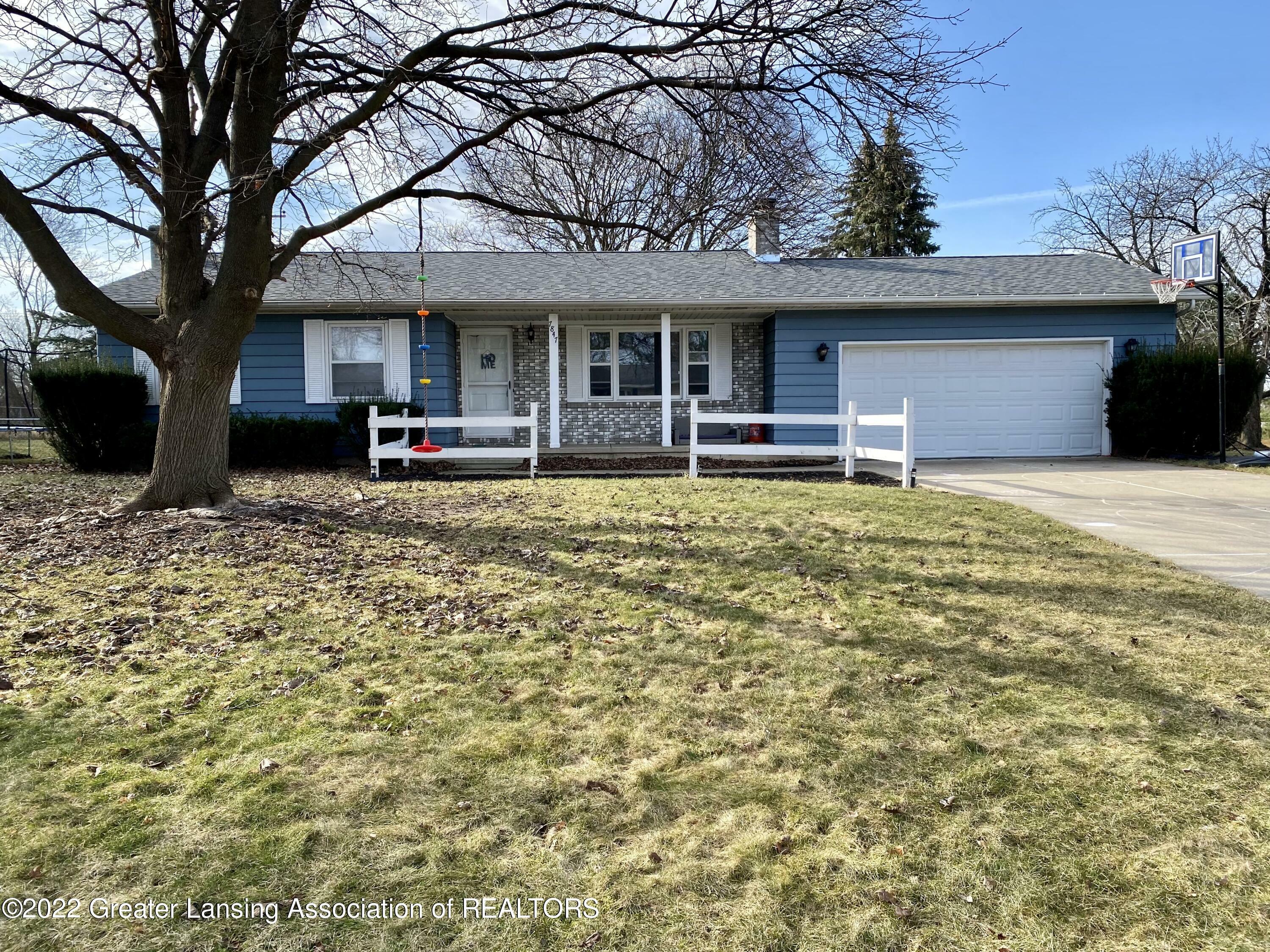 Property Photo:  7847 Cloverhill Drive  MI 48917 