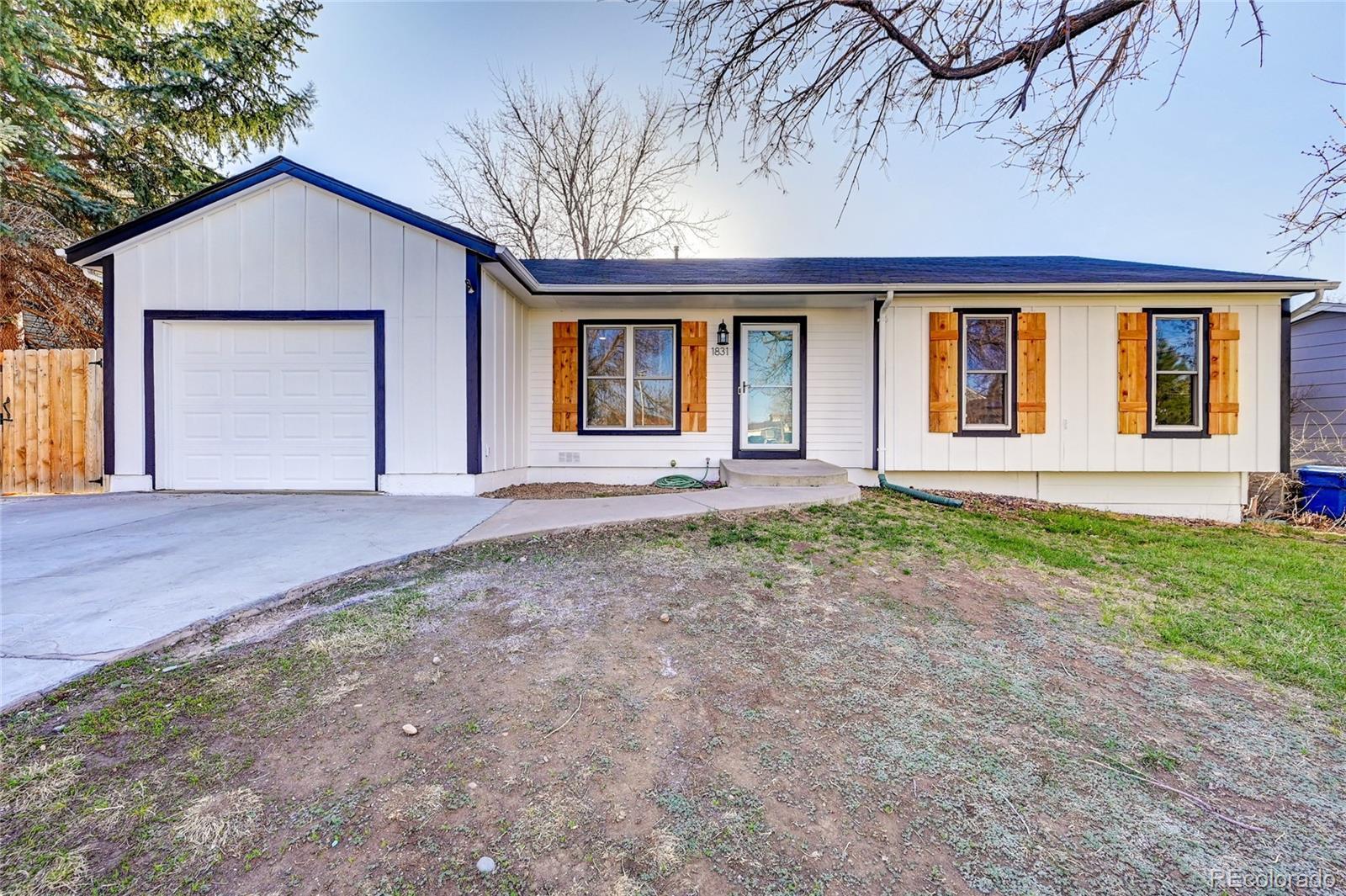 Property Photo: 1831 S Walden Way CO 80017