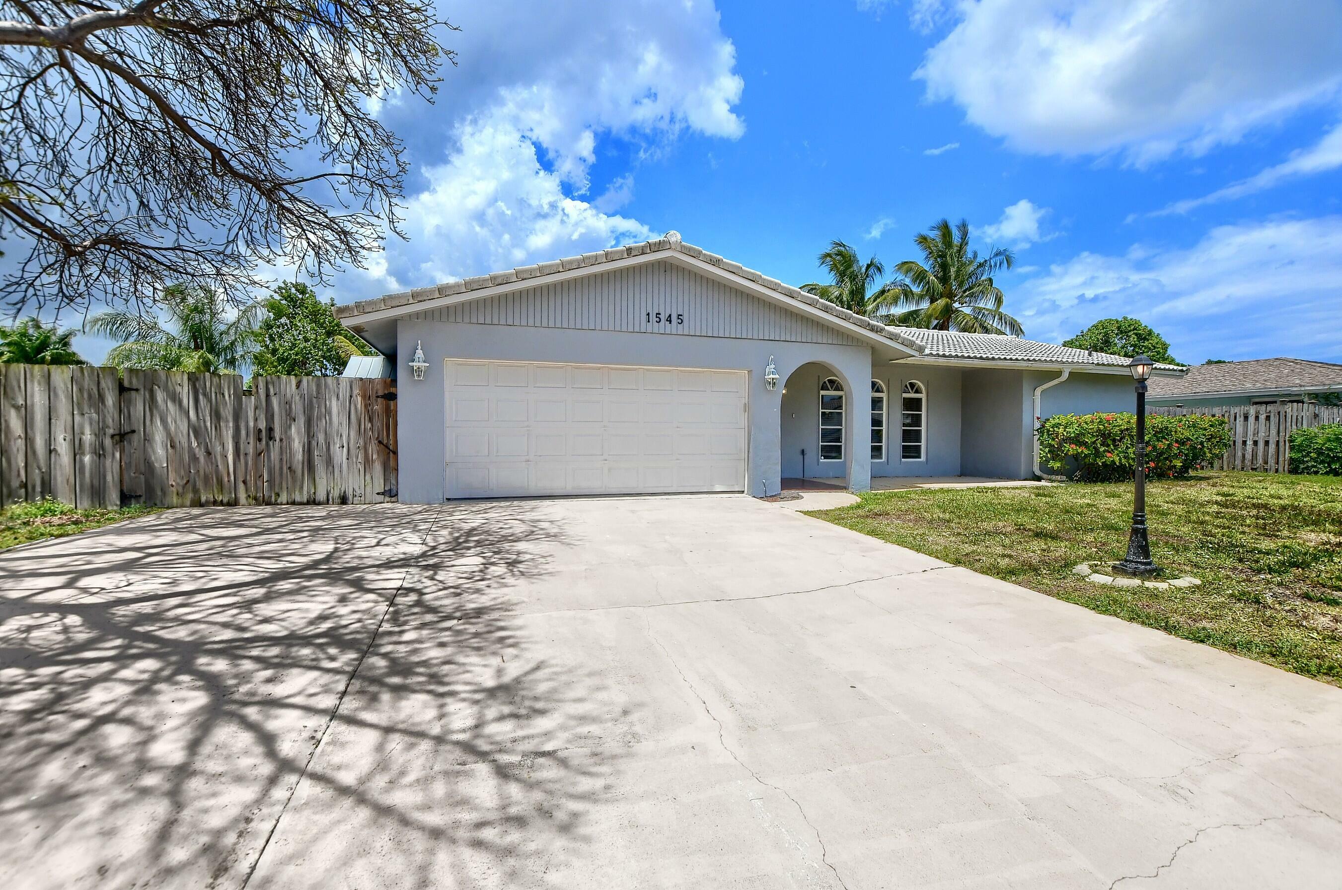 Property Photo:  1545 SW 13th Street  FL 33486 