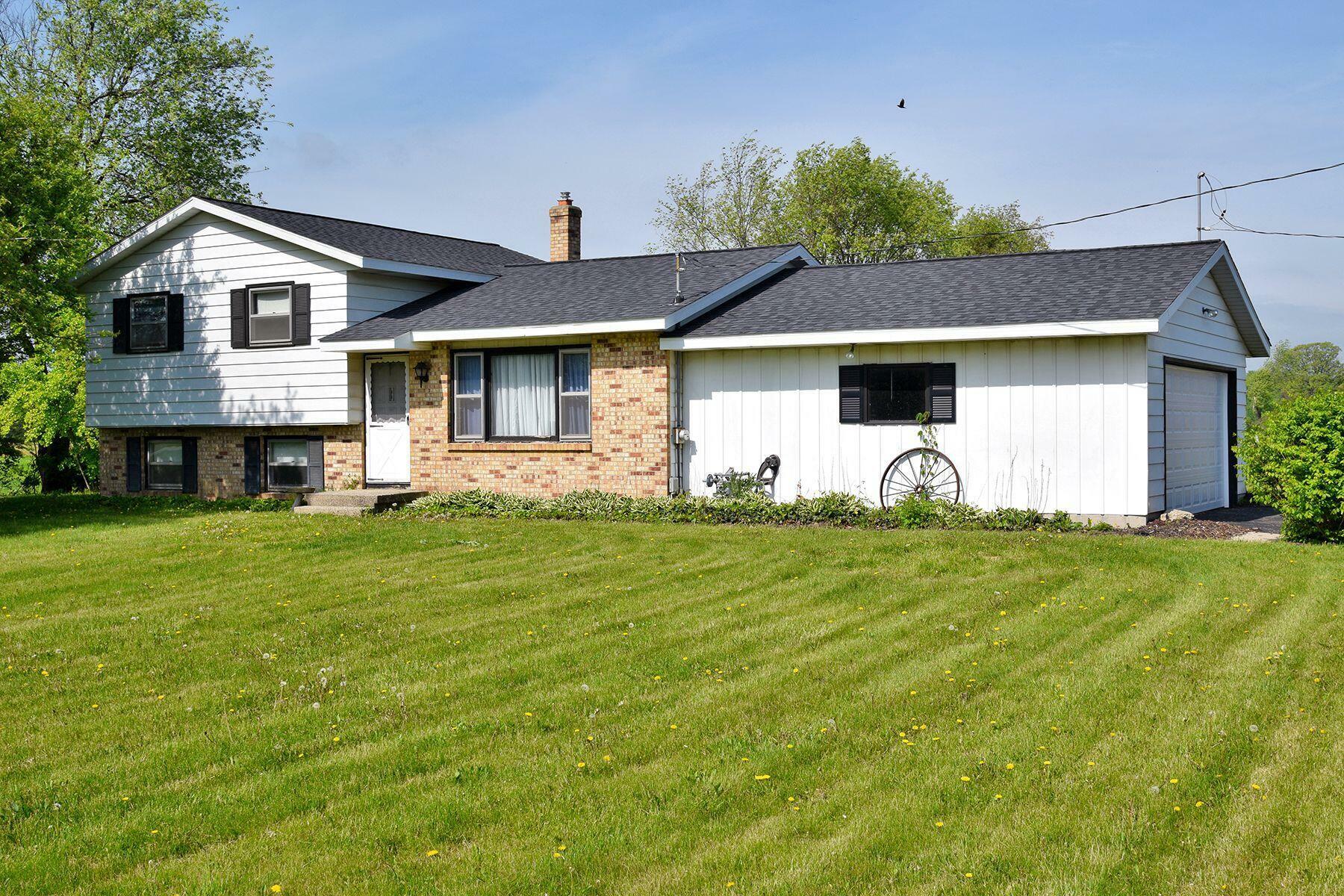 Property Photo:  7411 Pine Island Drive NE  MI 49306 