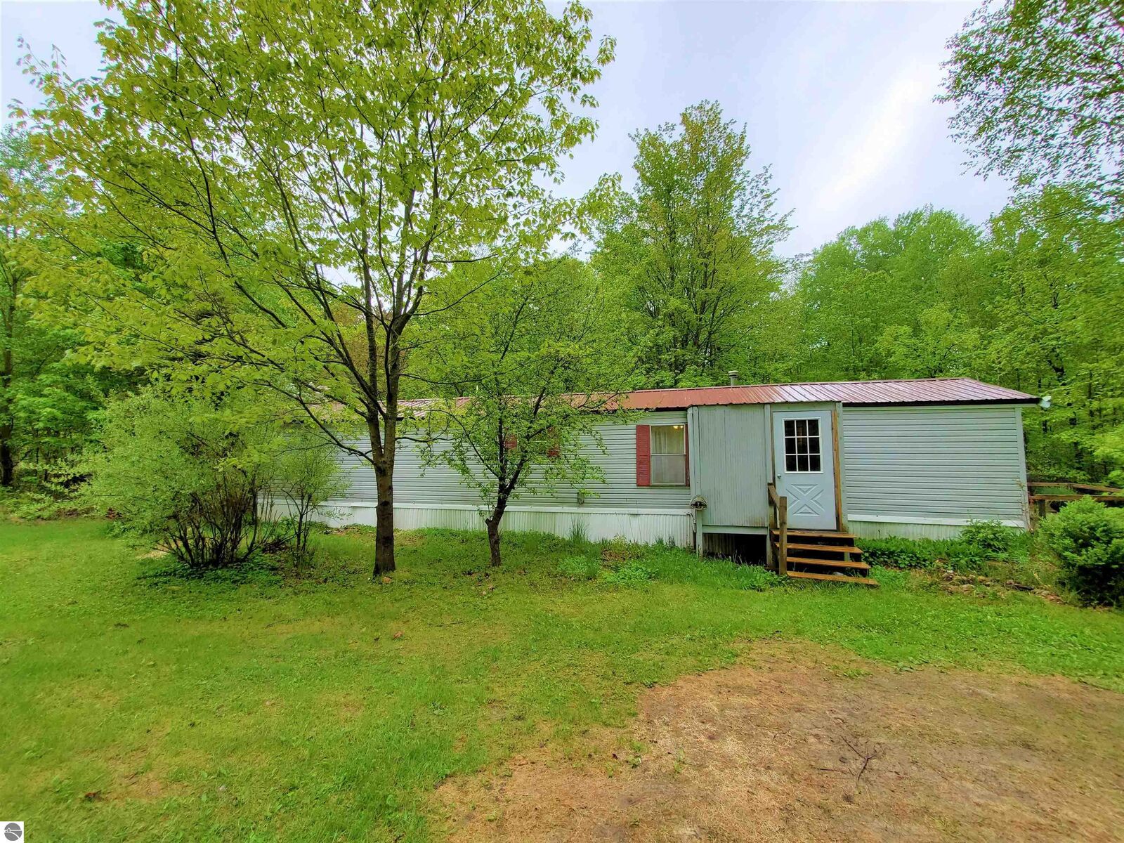 Property Photo:  11088 SW Creighton Road  MI 49633 
