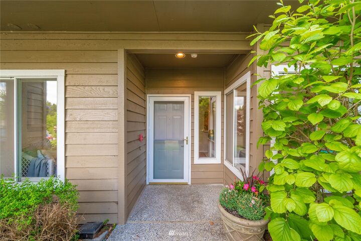 Property Photo:  3623 224th Place SE 1360  WA 98029 