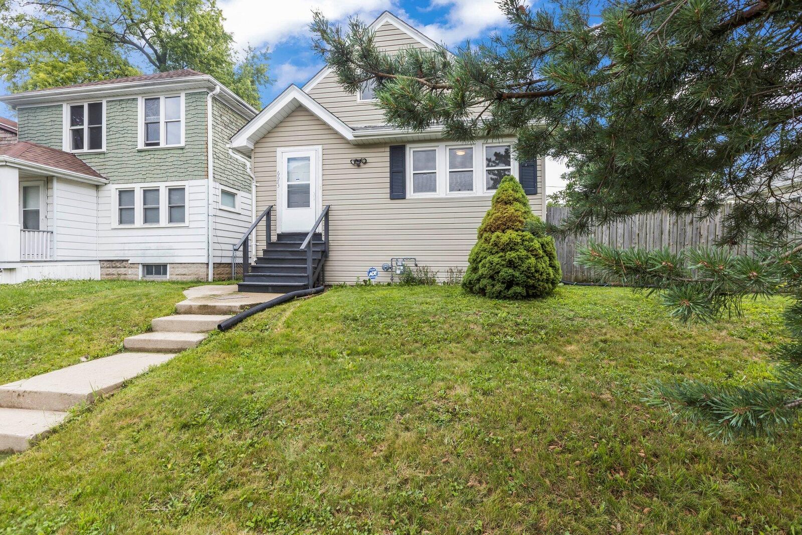 Property Photo:  6653 W Burleigh St  WI 53210 