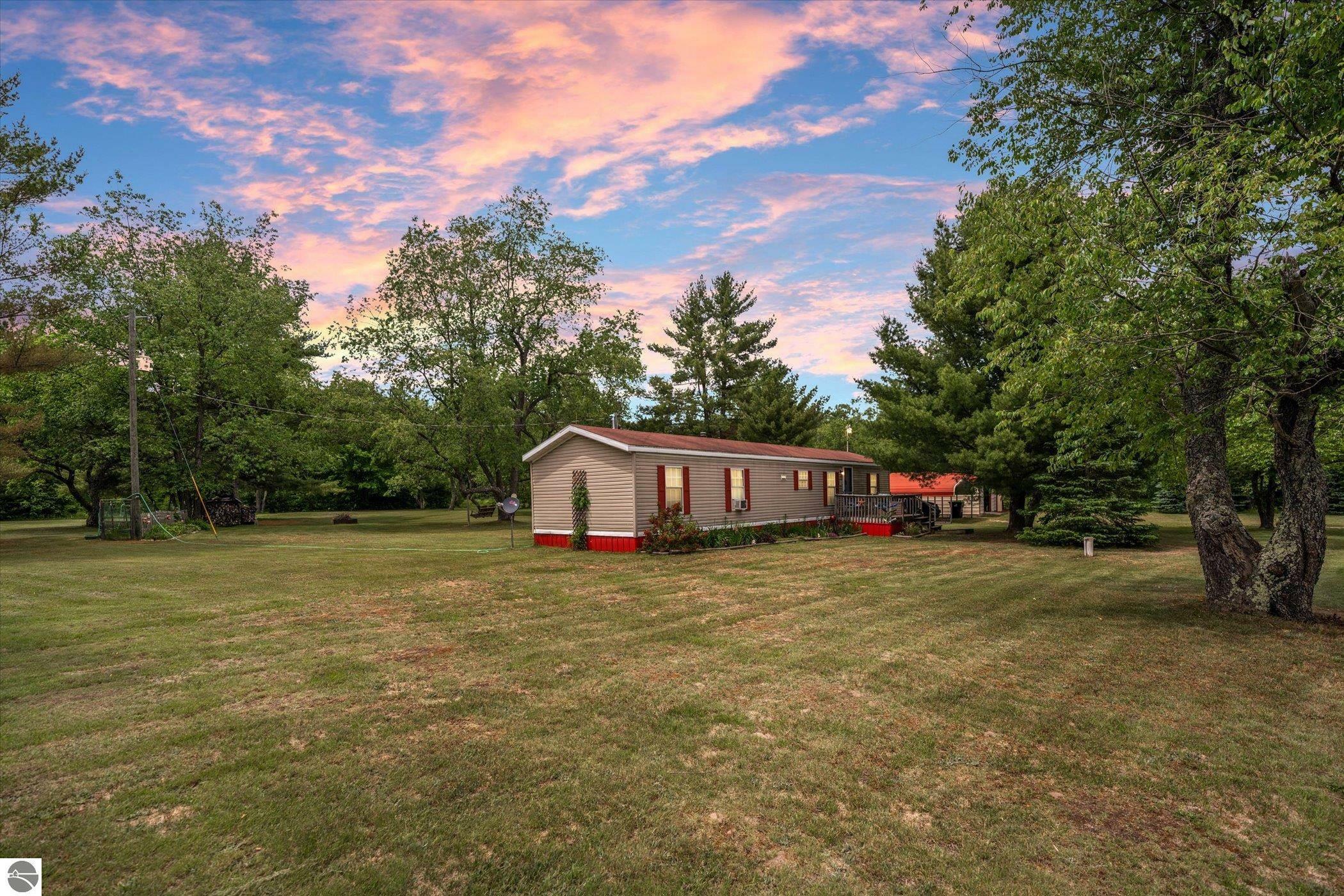 Property Photo:  4133 Sanmott Trail  MI 49646 