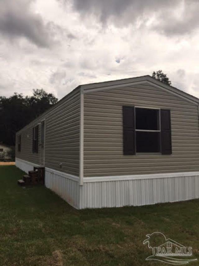 Property Photo:  9788 Fowler Ave  FL 32534 