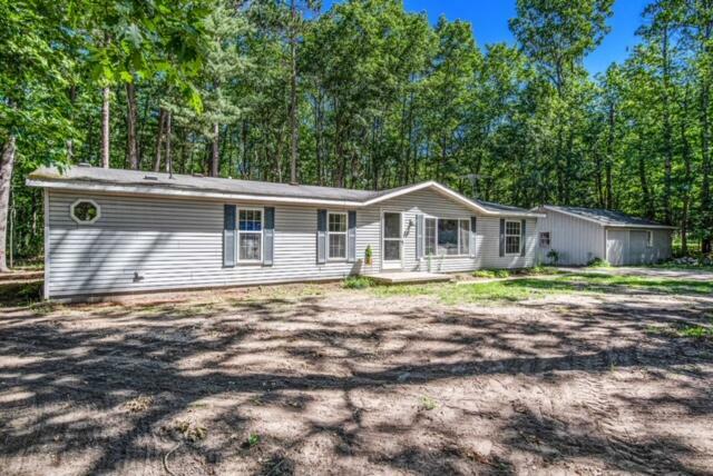 Property Photo: 7034 Frontenac Avenue MI 49749