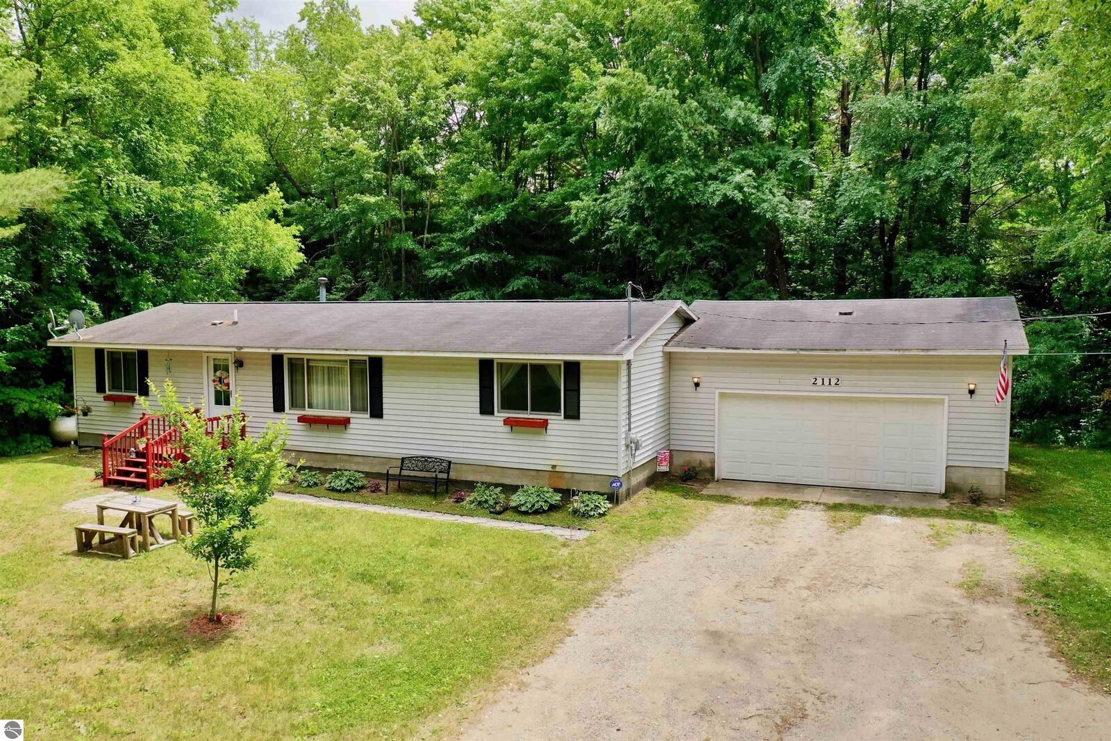 Property Photo:  2112 E M-55  MI 49601 