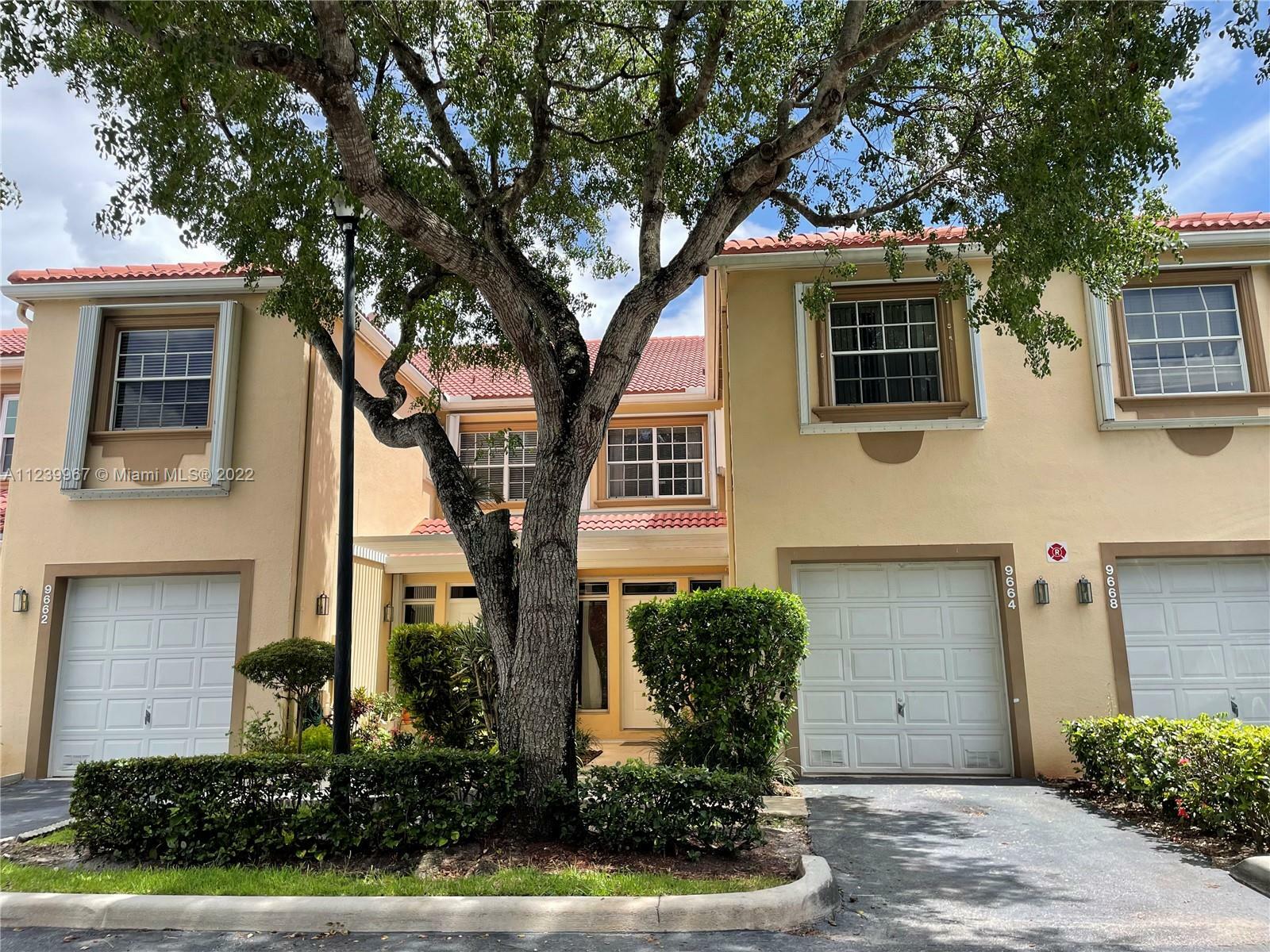 Property Photo:  9664 Royal Palm Blvd 40-7  FL 33065 