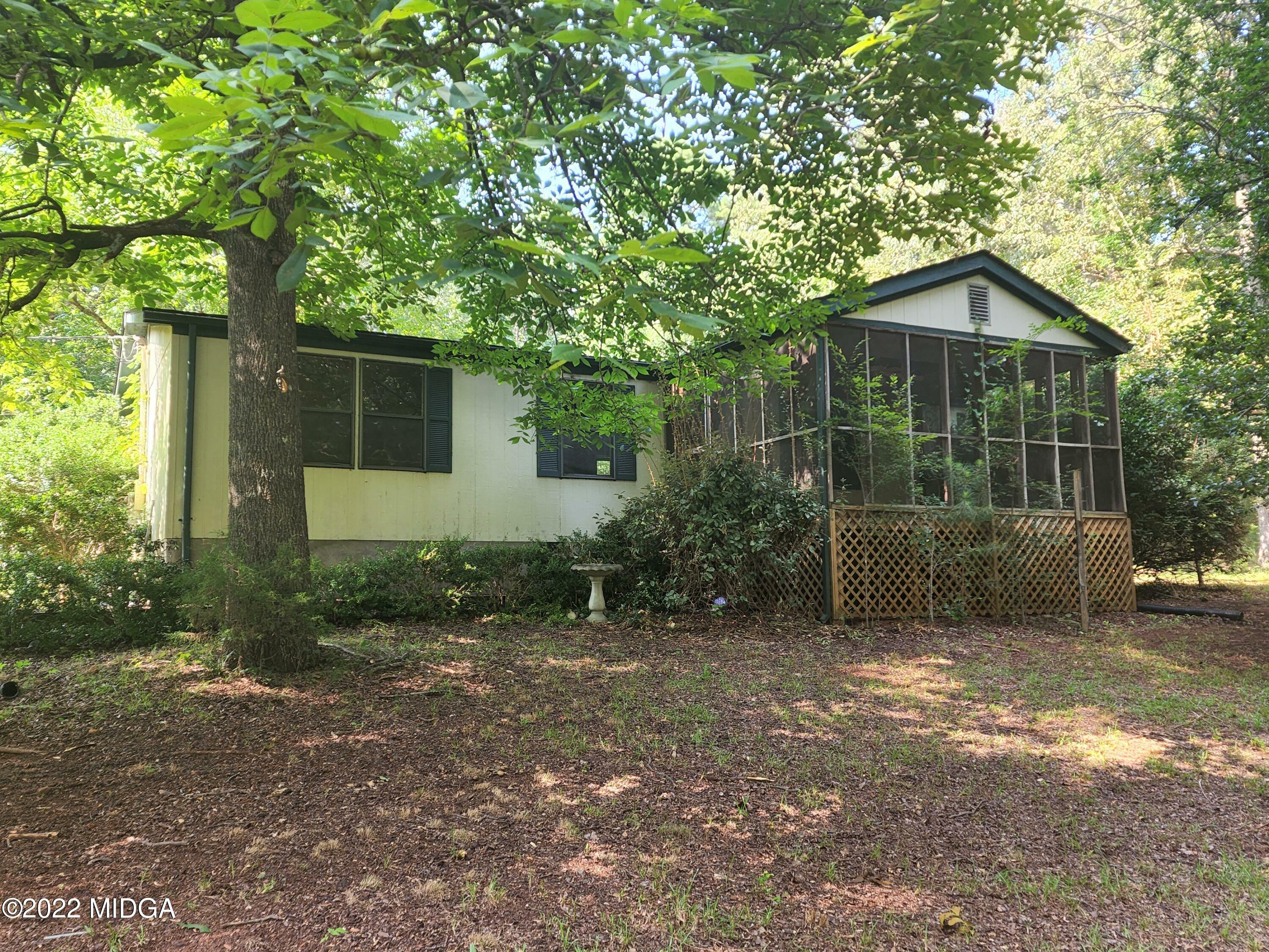 Property Photo:  127 Collins Road  GA 30233 