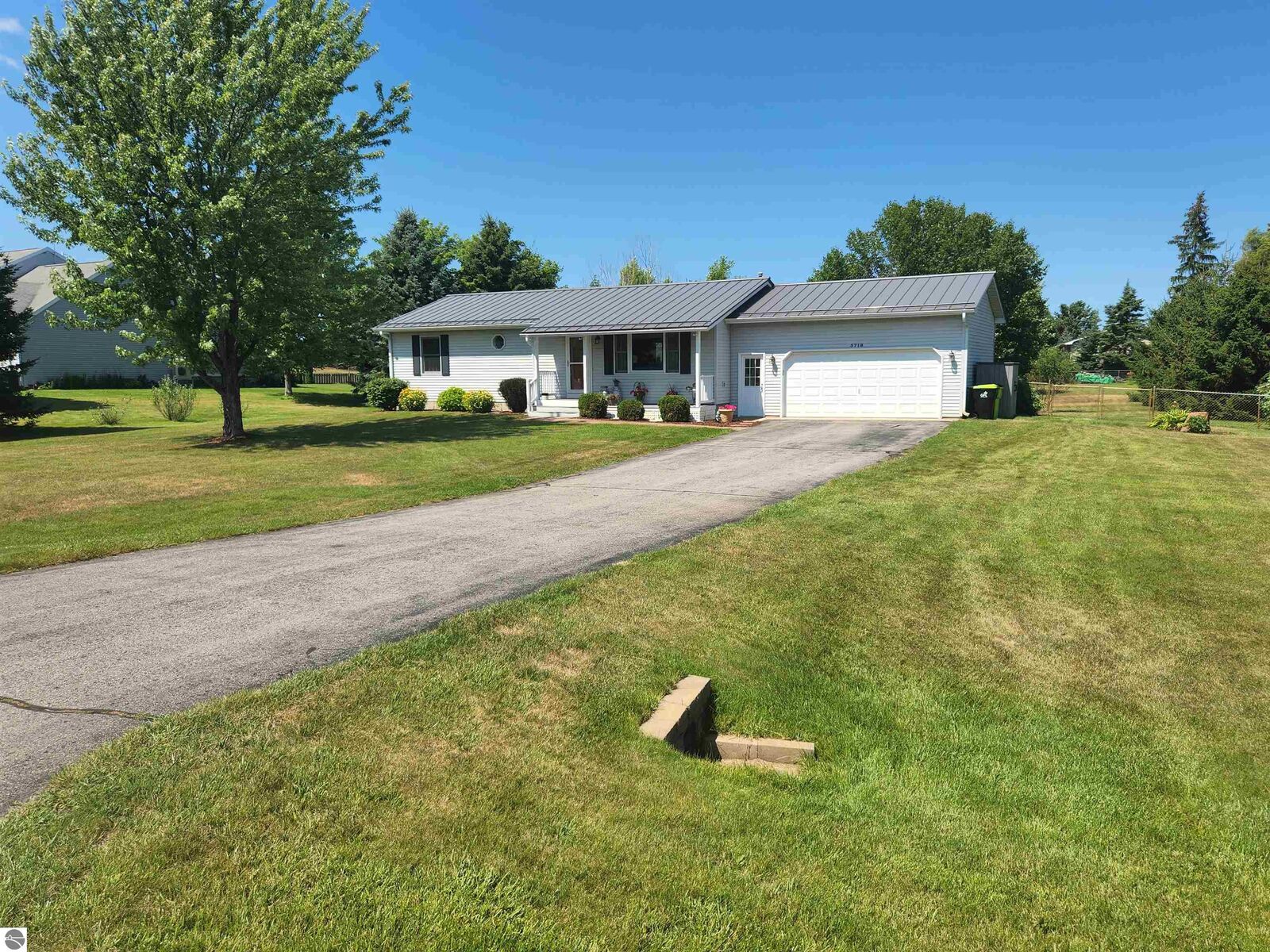 Property Photo:  5718 Cherry Blossom Drive  MI 49685 