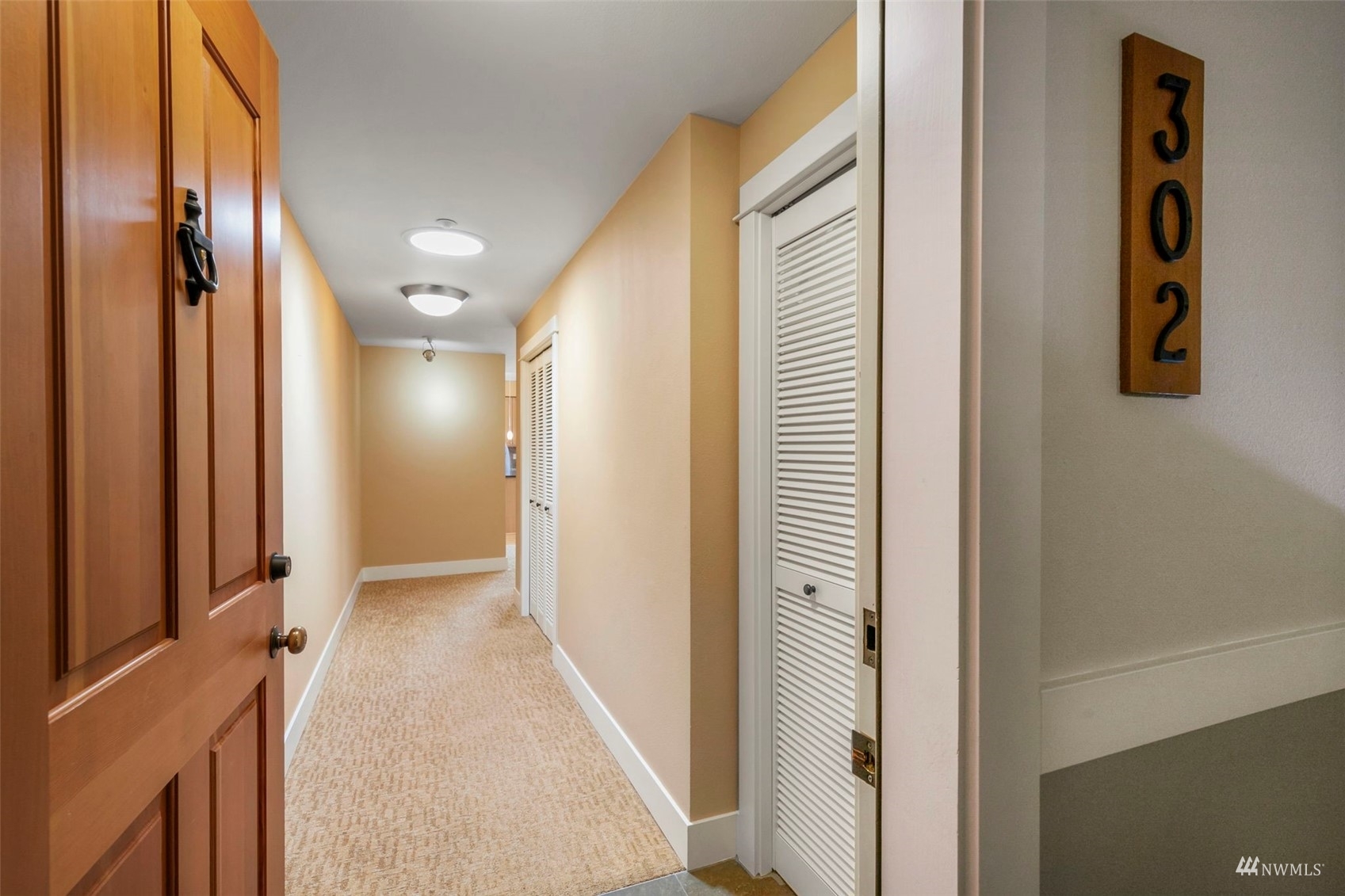 Property Photo: 120 Hall Brothers Loop 302 WA 98110