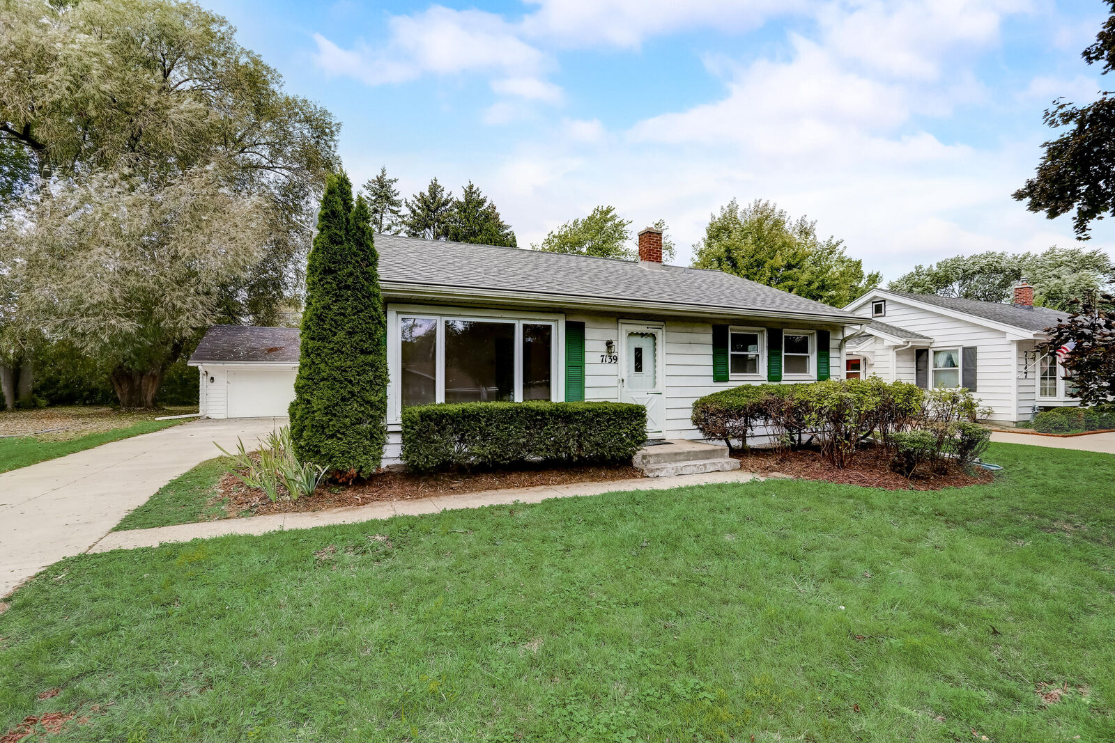 Property Photo:  7139 N Seneca Ave  WI 53217 