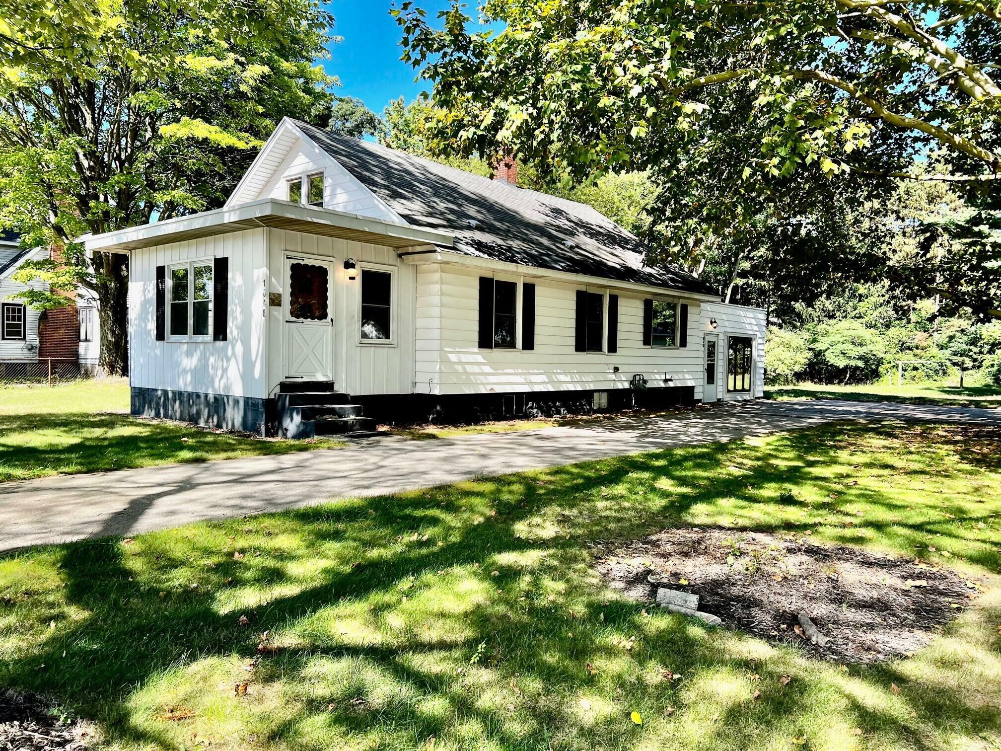 Property Photo:  1040 Seminole Road  MI 49441 