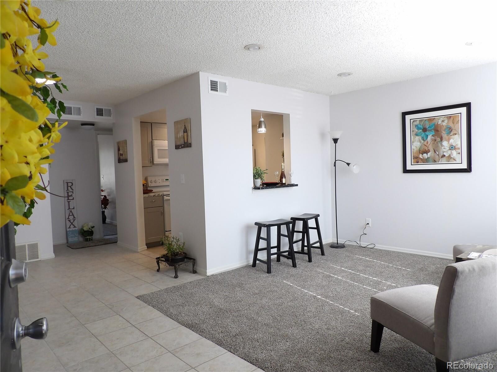 Property Photo:  3550 S Harlan Street 206  CO 80235 