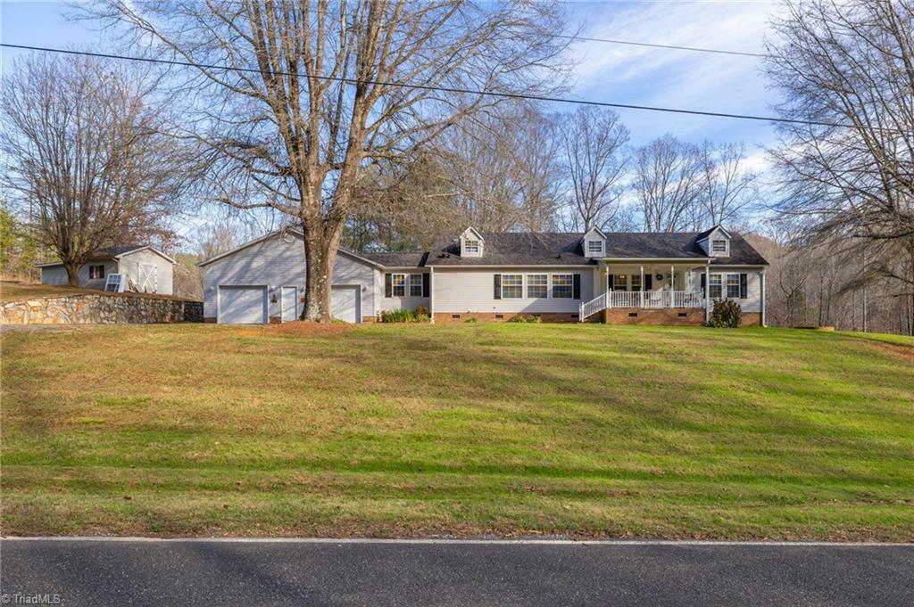 Property Photo:  1620 Tom Shelton Road  NC 27046 