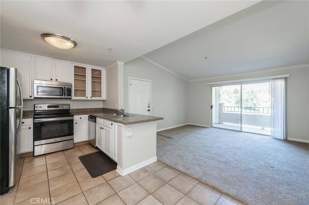 Property Photo:  1965 Las Colinas Circle 303  CA 92879 