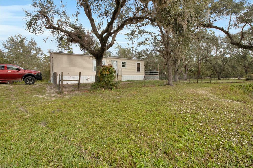 Property Photo:  1422 NW Pine Wood Avenue  FL 34266 