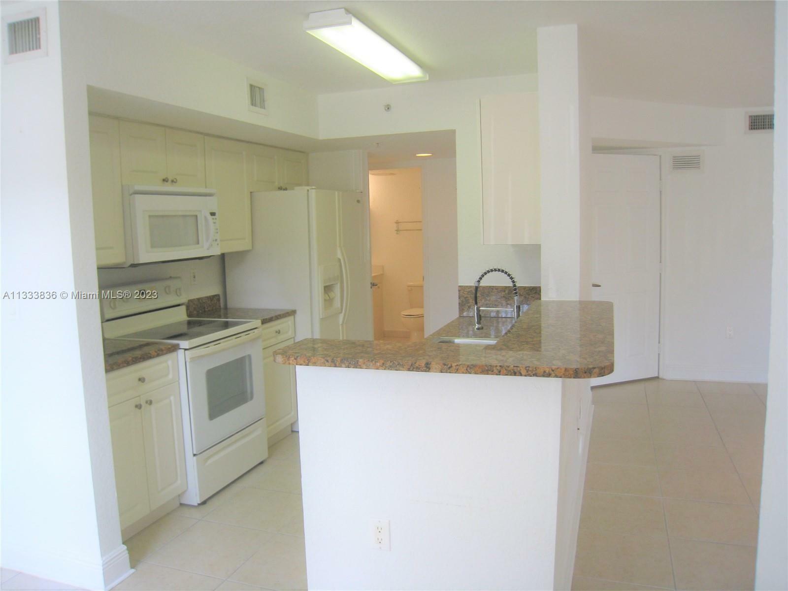 Property Photo:  21000 SW 87th Ave 101  FL 33189 