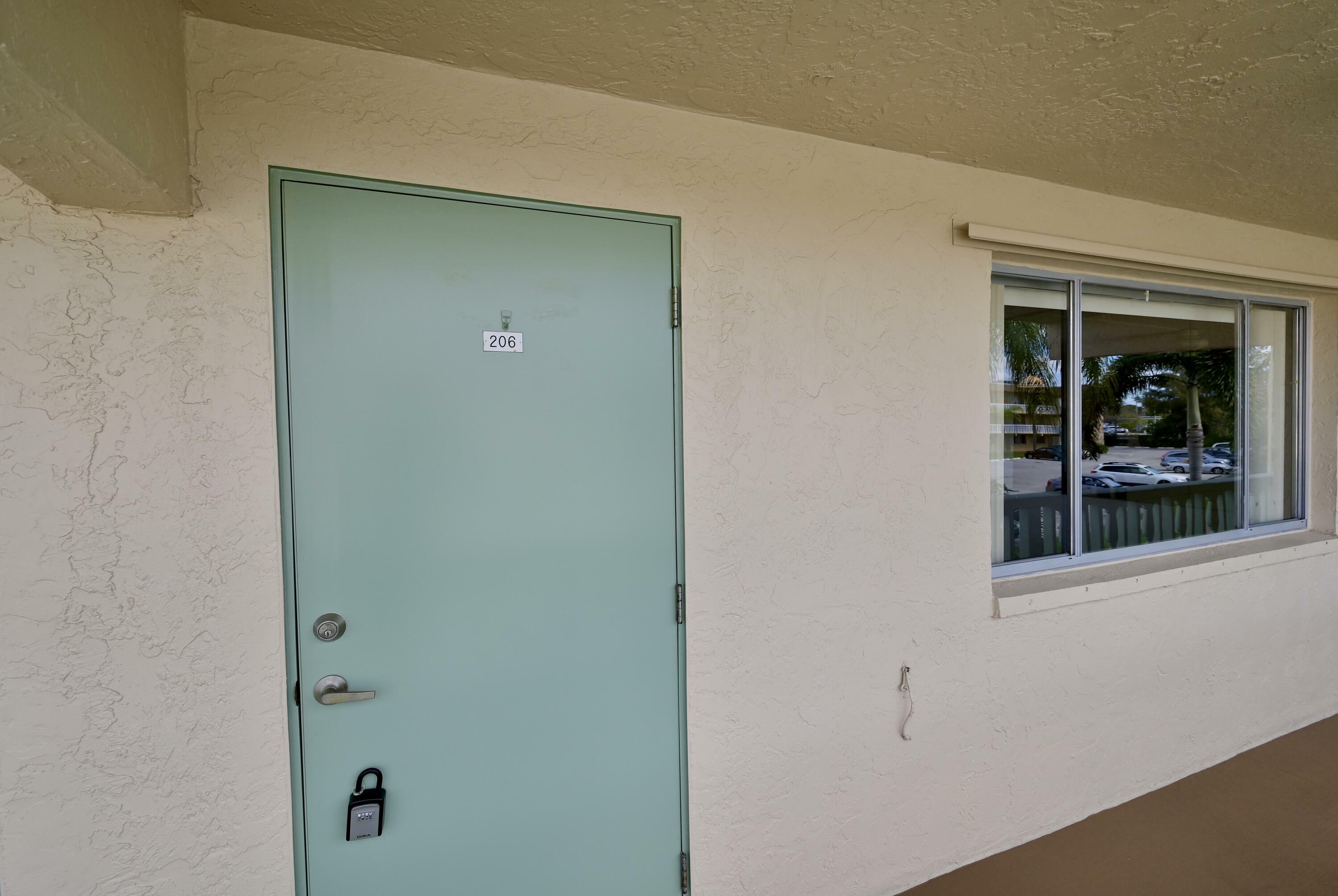 Property Photo: 700 Village Green Court 206 FL 33461