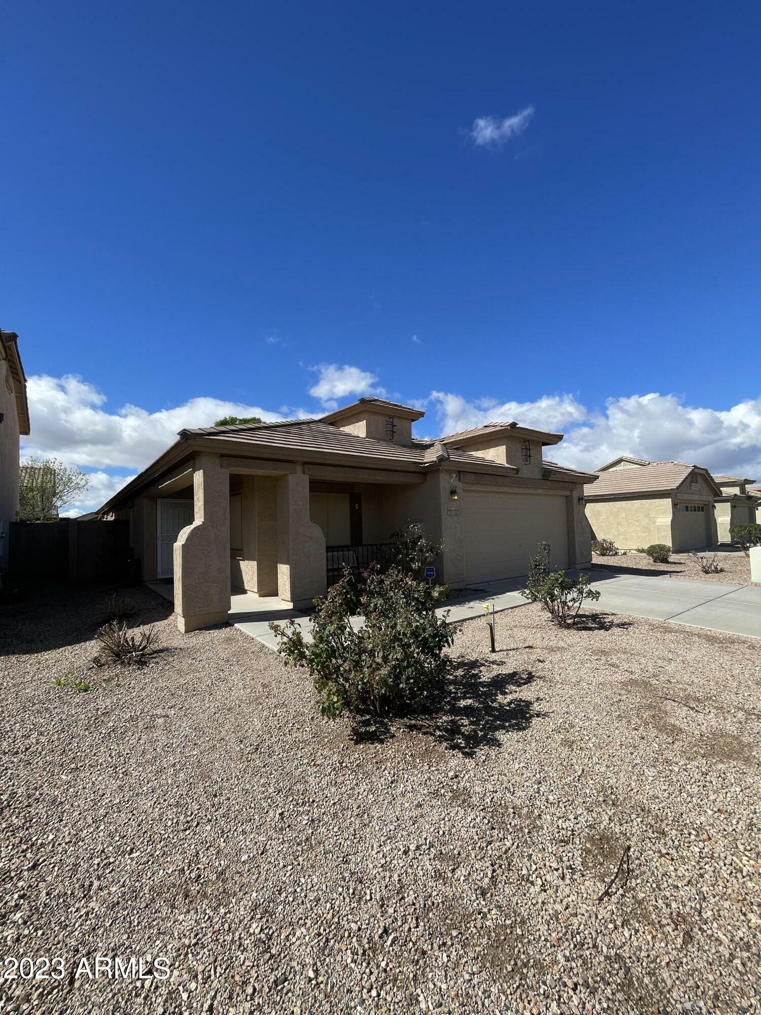 Property Photo:  43277 W Blazen Trail  AZ 85138 