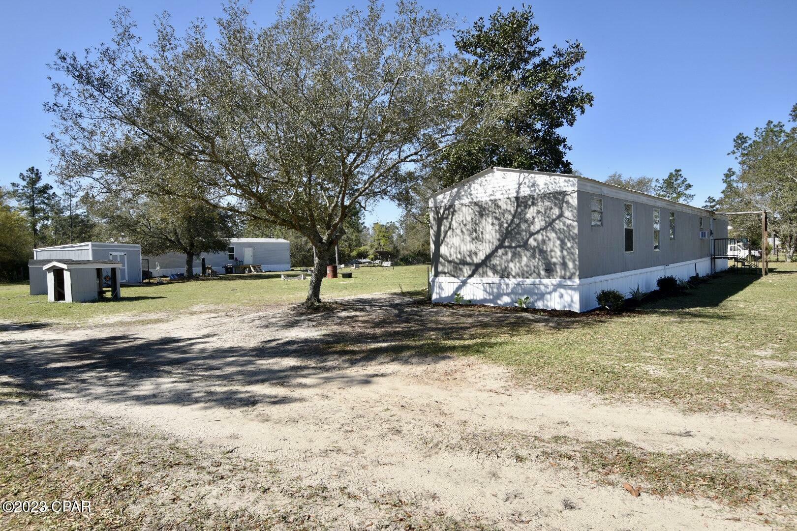 Property Photo:  2717 NW County Road 274  FL 32421 