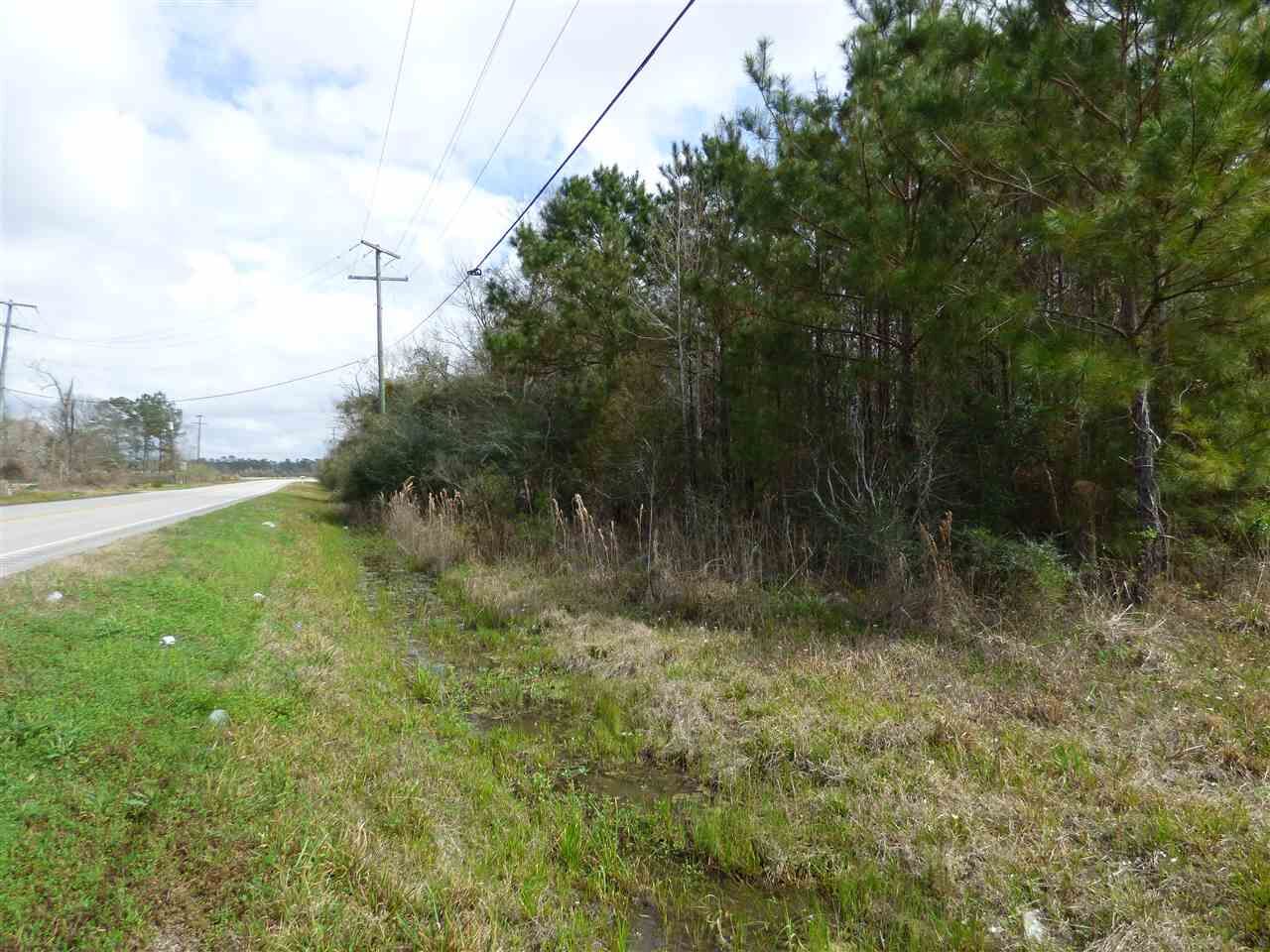 Property Photo:  0000 Fm 105  TX 77630-1126 