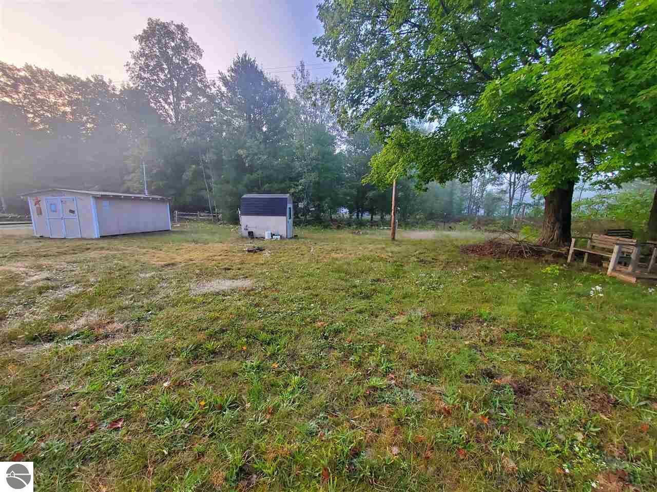 Property Photo:  11155 Hodenpyle Dam Road  MI 49668 