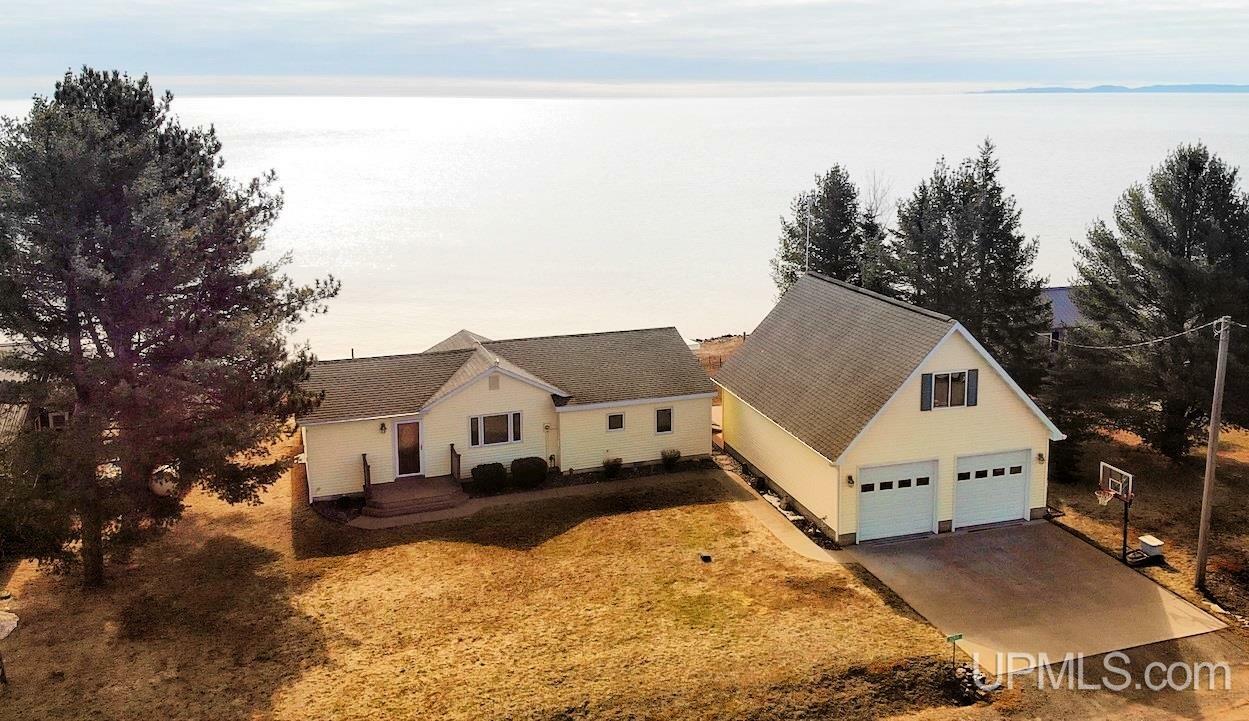 Property Photo:  52812 S Big Traverse Bay Road  MI 49945 