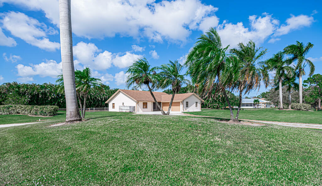 Property Photo: 6231 Banyan Boulevard FL 33470