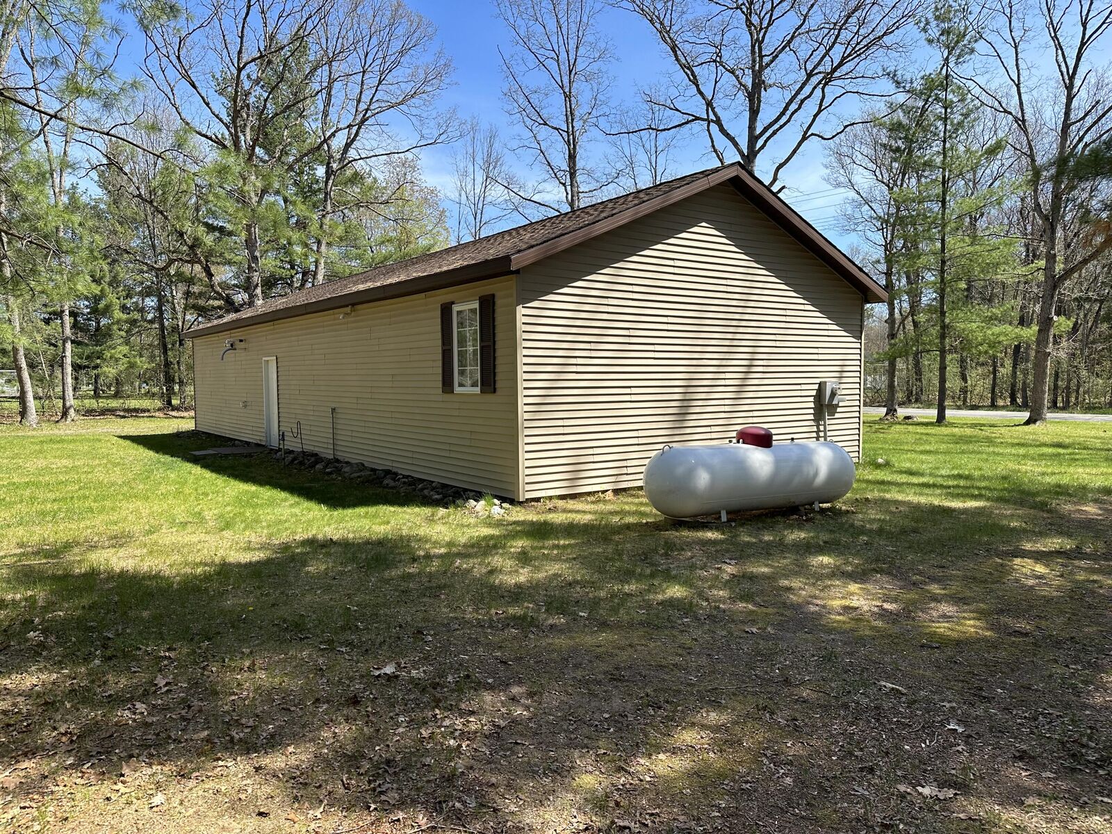 Property Photo:  7861 N Bass Lake Road  MI 49644 