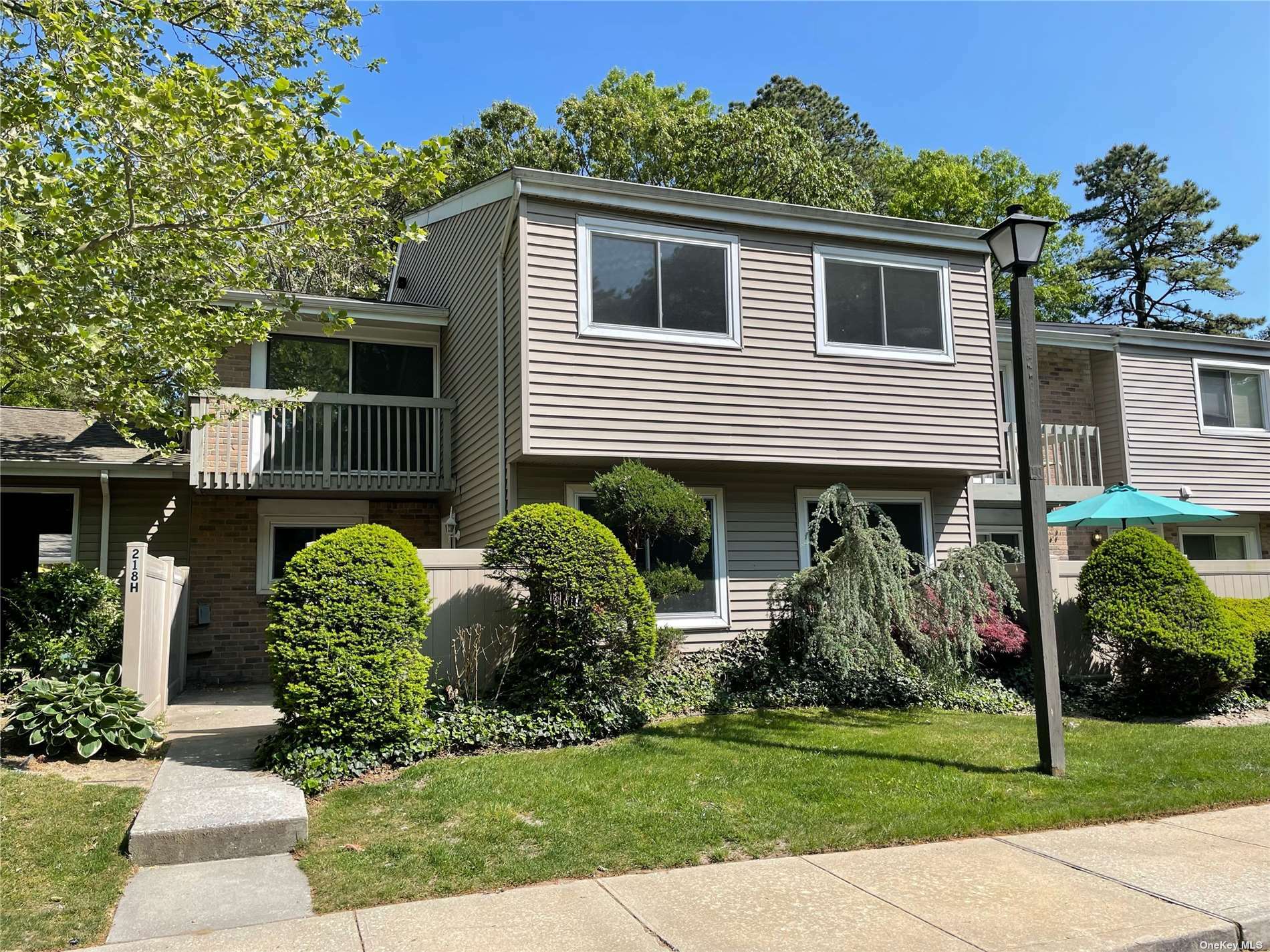 Property Photo:  218 Springmeadow Drive H  NY 11741 