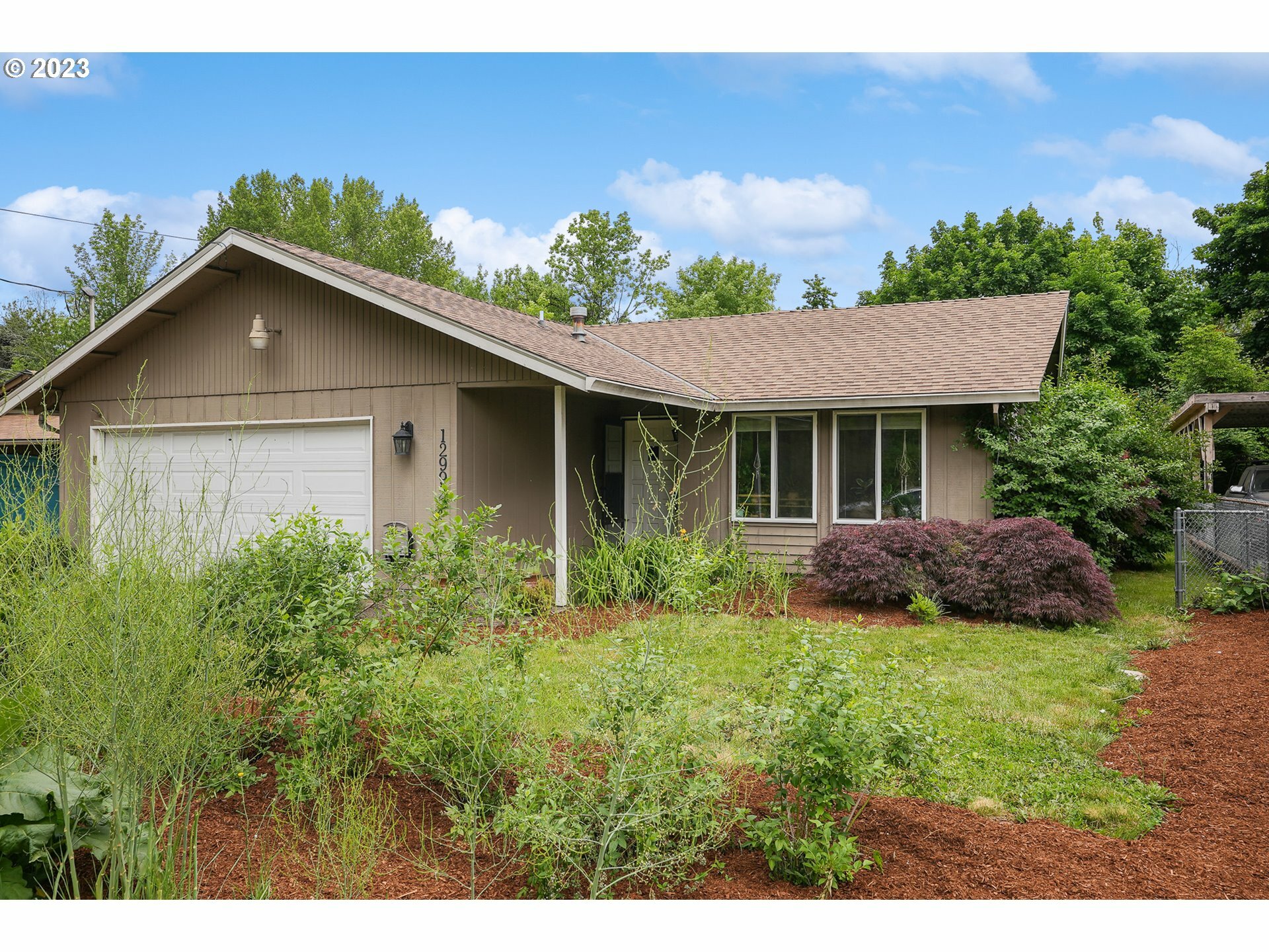 Property Photo: 12992 SE Rusk Rd OR 97222