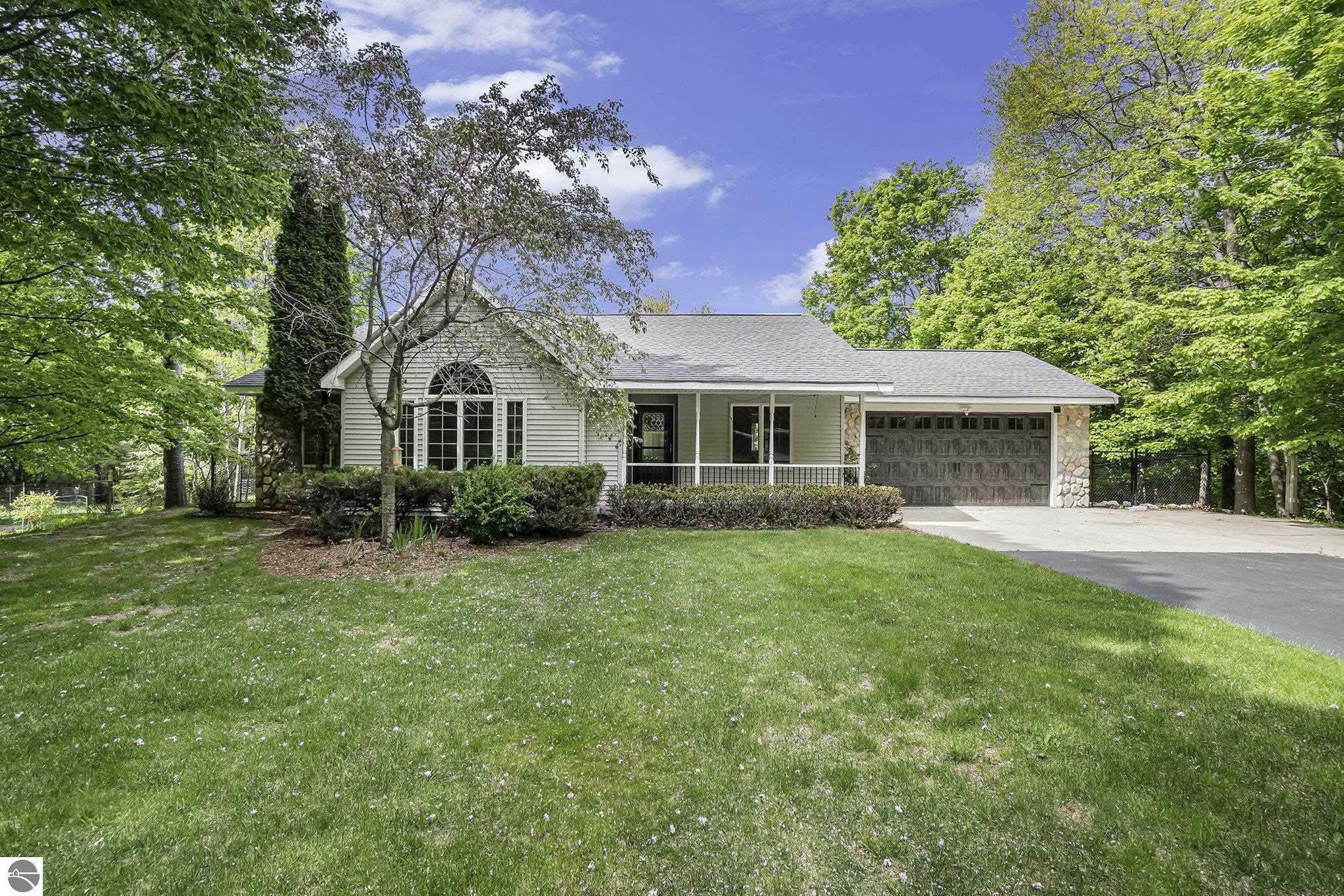 Property Photo:  189 Beech Street  MI 49635 