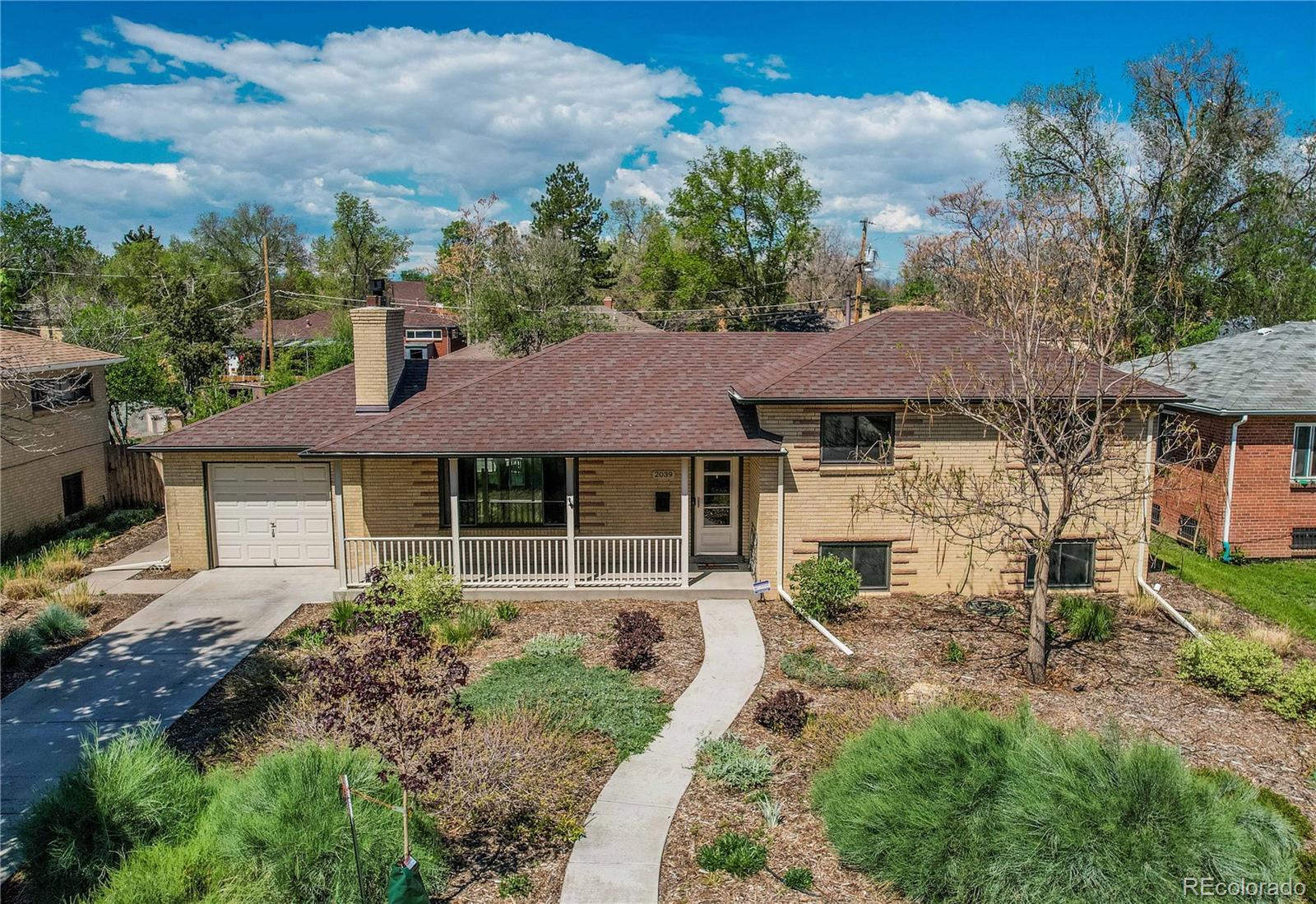 Property Photo:  2039 Kenton Street  CO 80010 