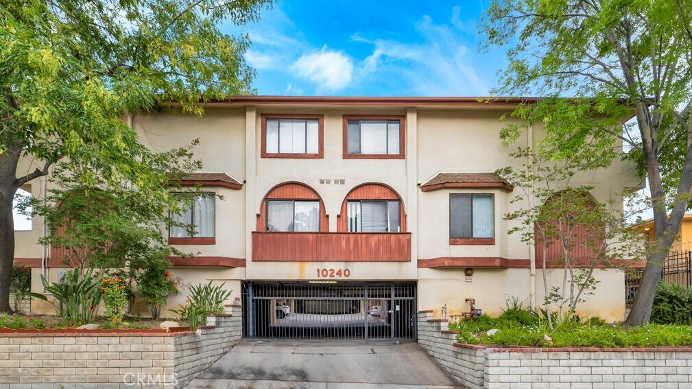 Property Photo: 10240 Silverton Avenue 12 CA 91042