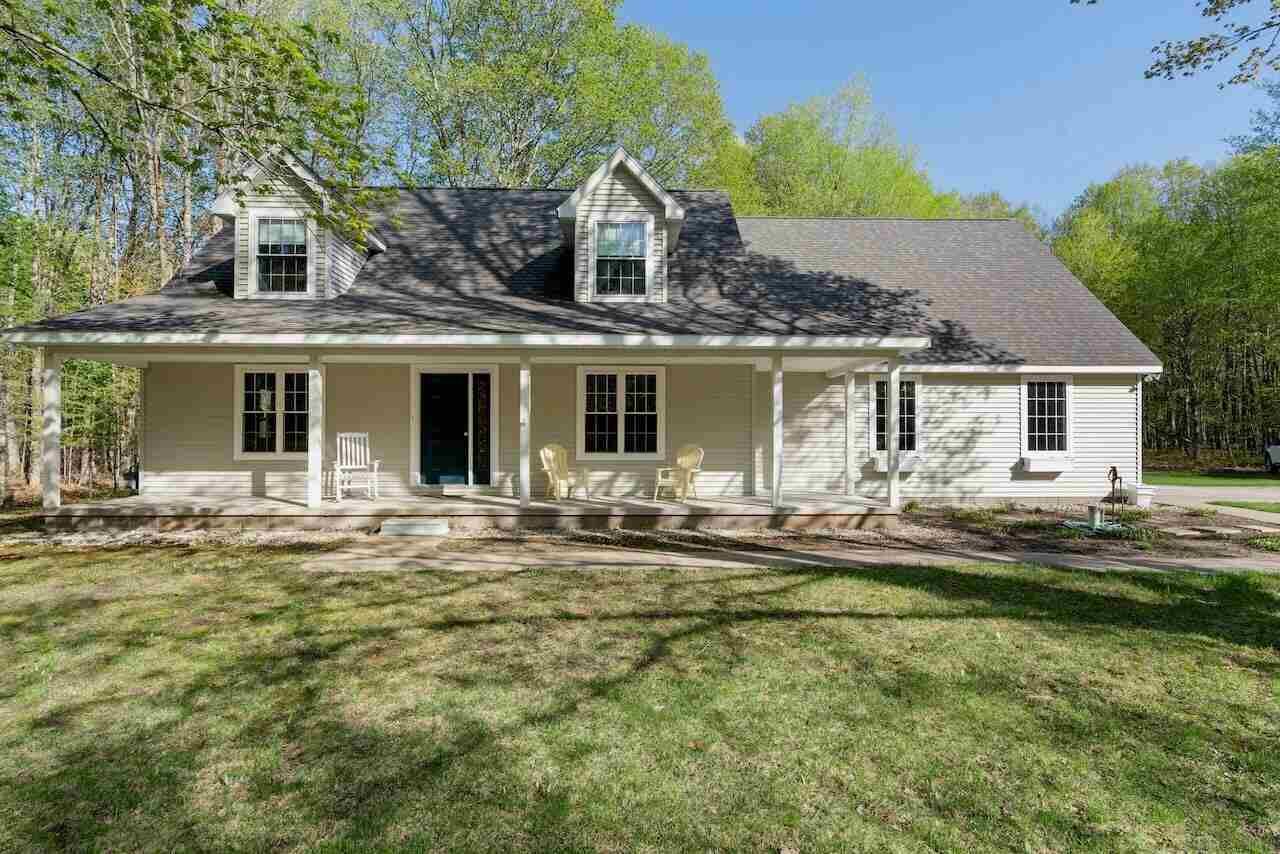 Property Photo:  11155 Hassler Woods  MI 49706 