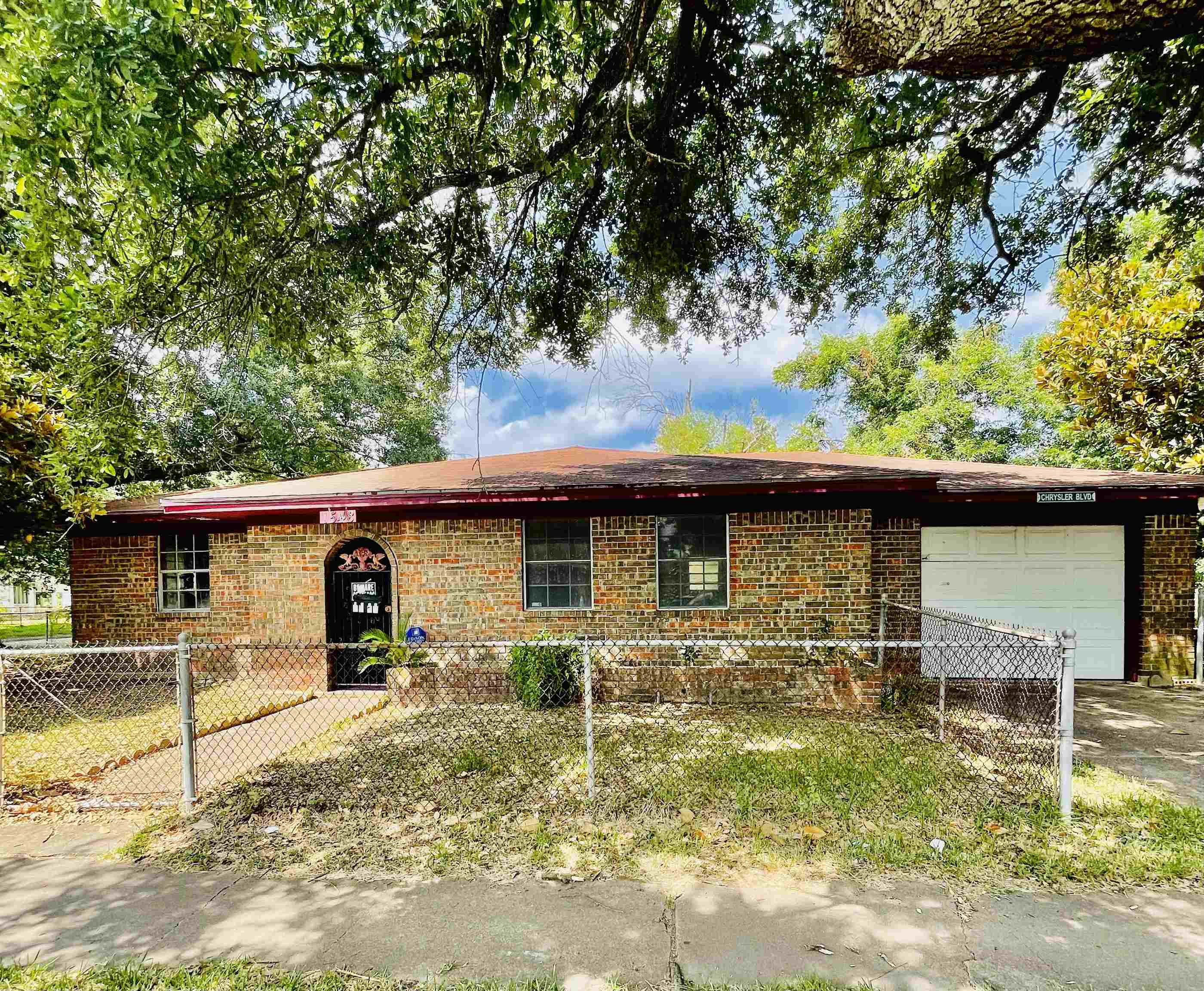 Property Photo:  1548 Booker T Washington  TX 77640-3005 