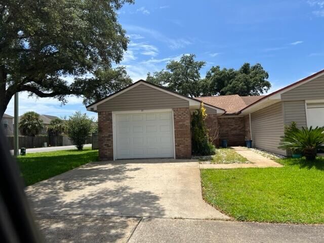 Property Photo: 219 Carmel Drive Unit 37 FL 32547