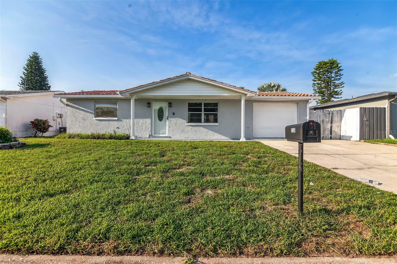 Property Photo: 7336 Heath Drive FL 34668