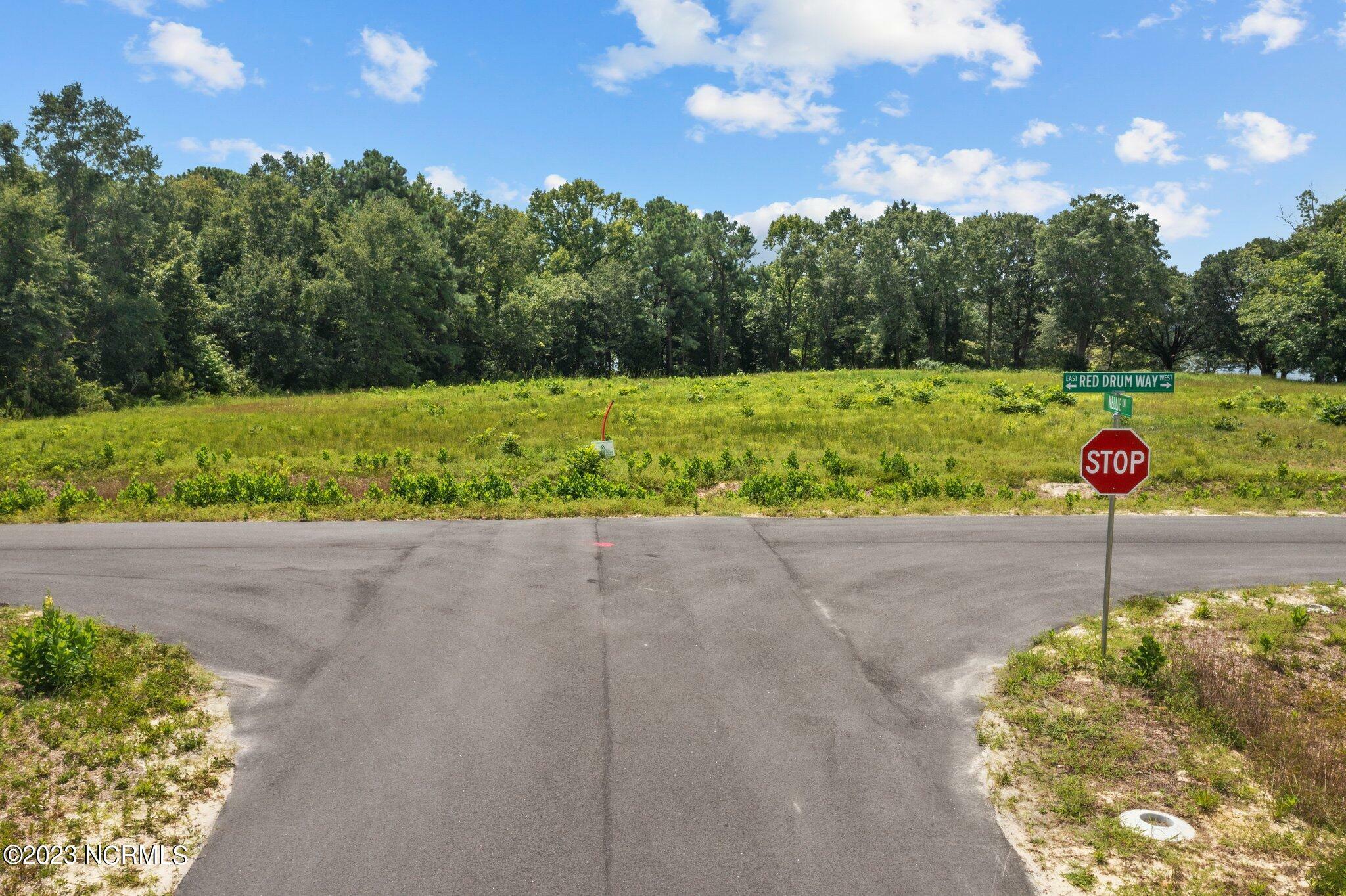 Property Photo:  506 Red Drum Way E  NC 28584 