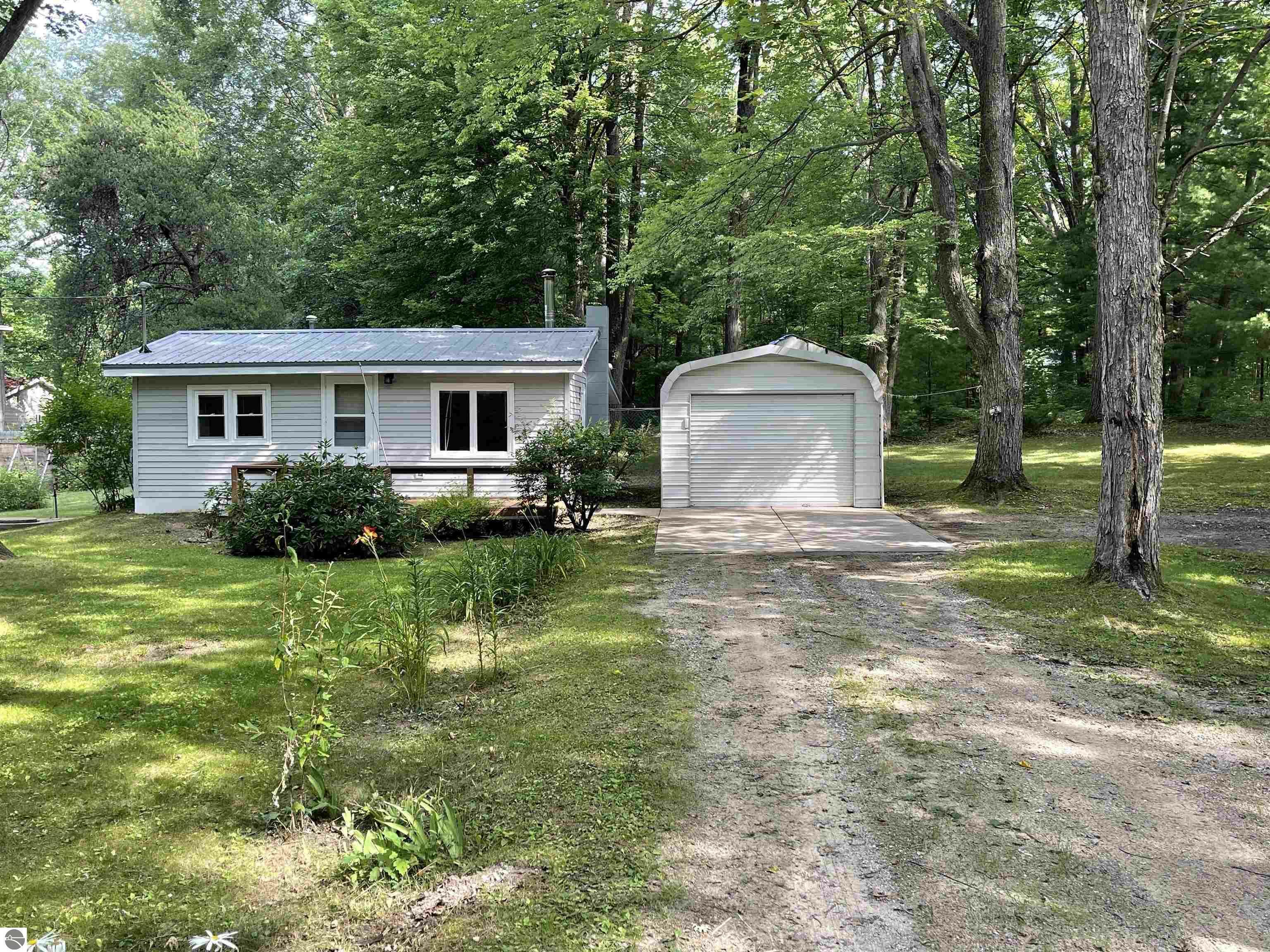 Property Photo:  211 E Clarence Road  MI 48625 