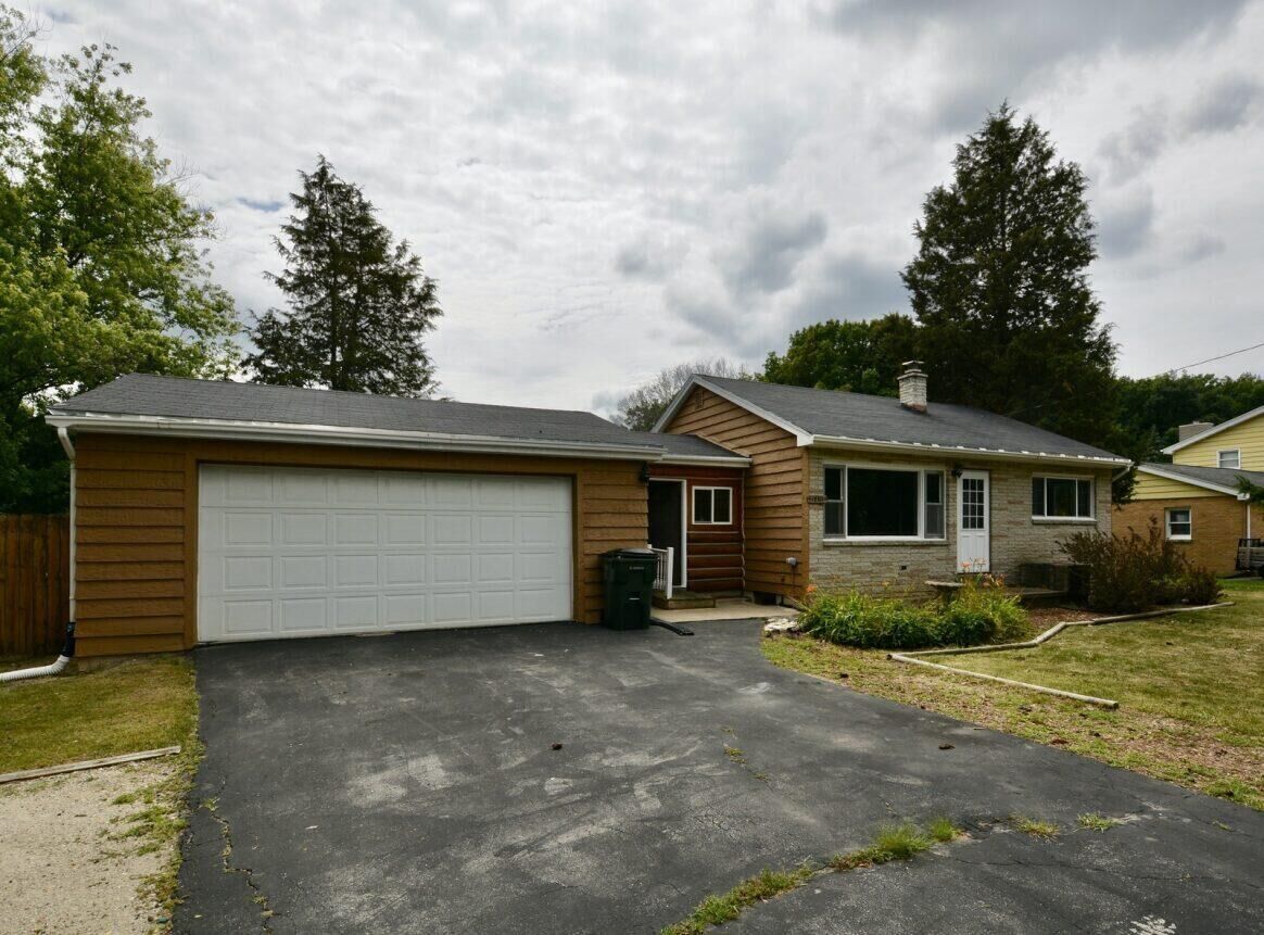Property Photo:  11401 W Layton Ave  WI 53228 