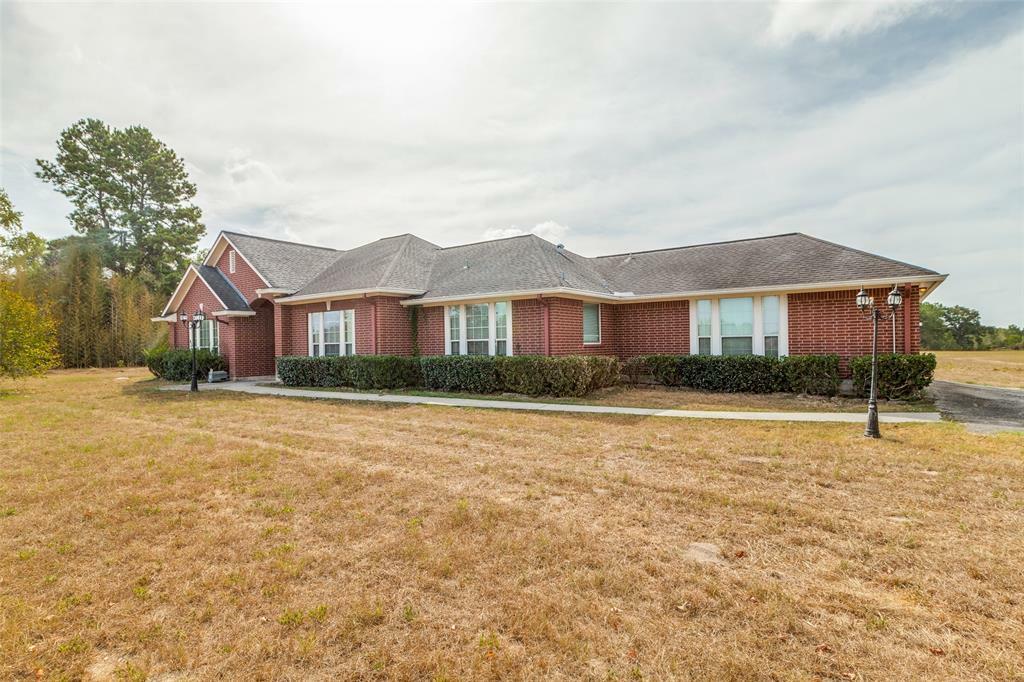 Property Photo: 8540 S Williams Road TX 77303