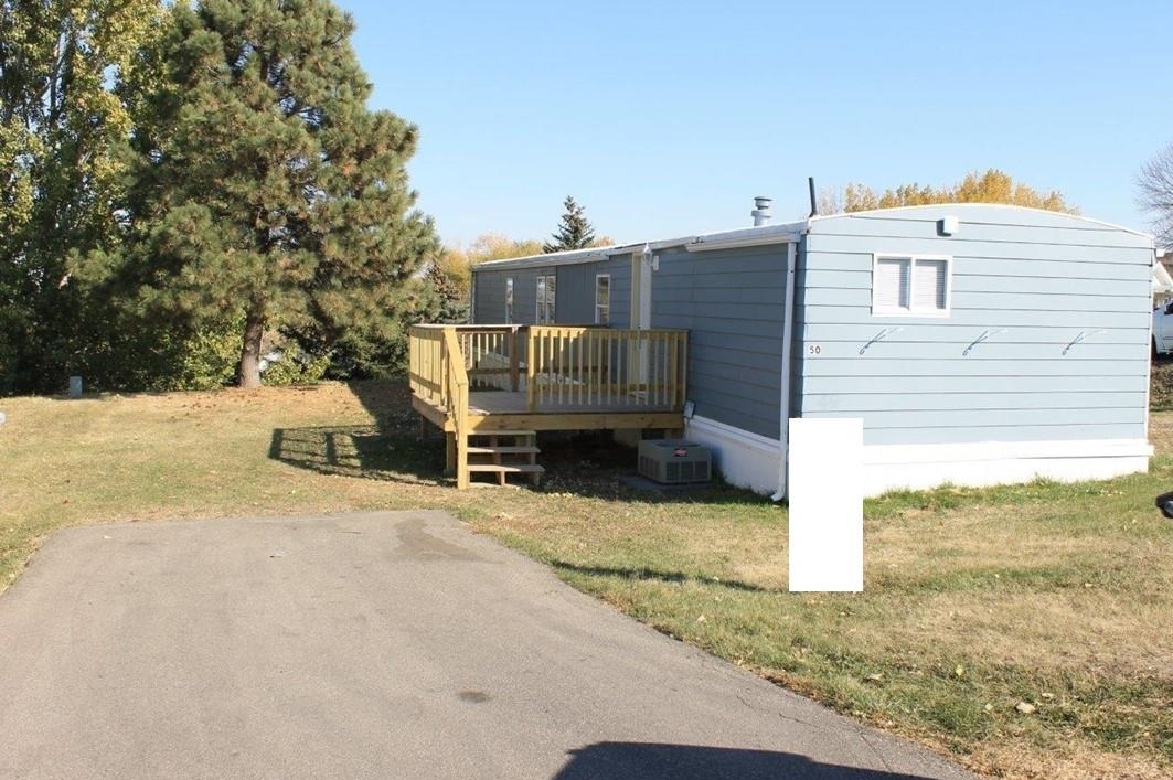 Property Photo:  1500 18th St SW #50 Lot #50  ND 58701 