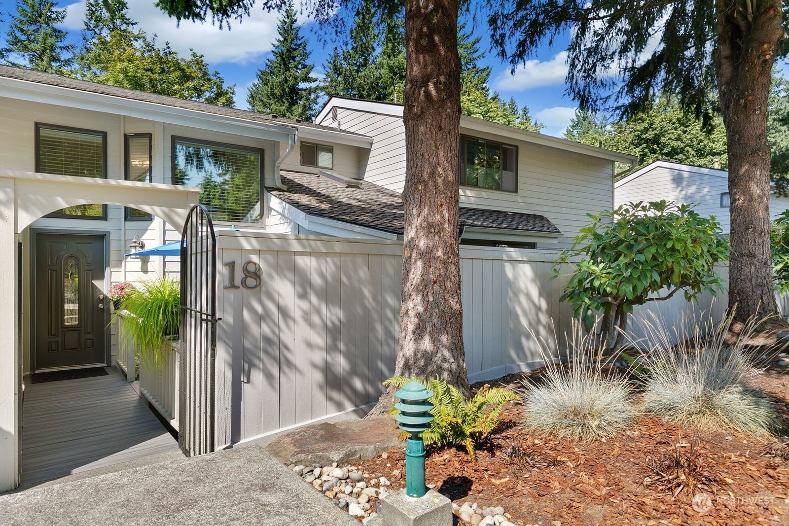 Property Photo:  15800 Village Green Drive 18  WA 98012 