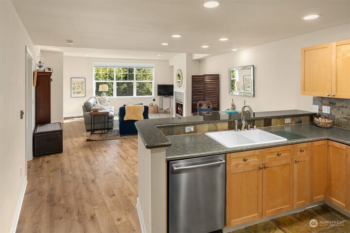 Property Photo:  1000 Cabin Creek Lane SW D-203  WA 98027 