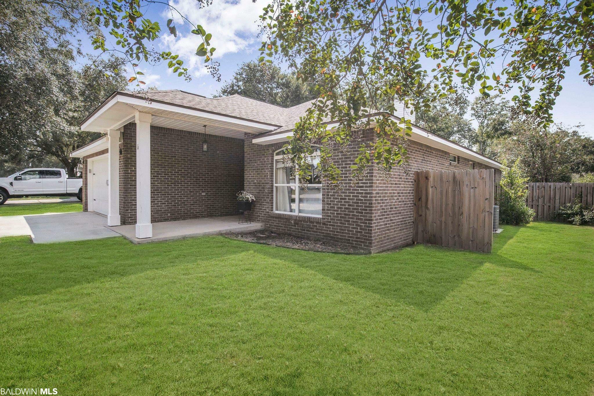 Property Photo:  7133 Raintree Lane  AL 36542 