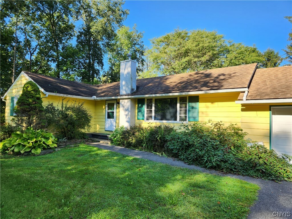 Property Photo:  410 Warren Road  NY 14850 